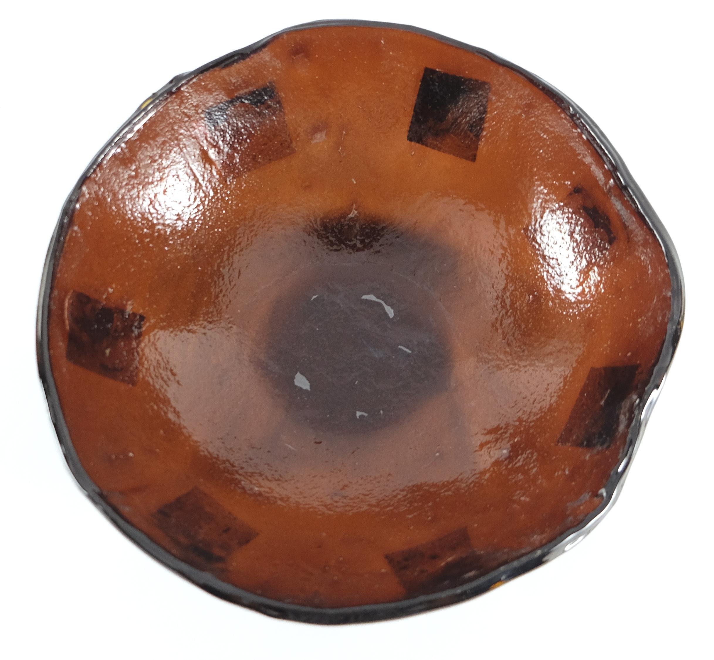 Italian Murano Glass Bowl with Gold Leaf Accents

Offered for sale is an Italian handblown brown Murano glass bowl created with subtle textures and infused gold leaf accents.

 