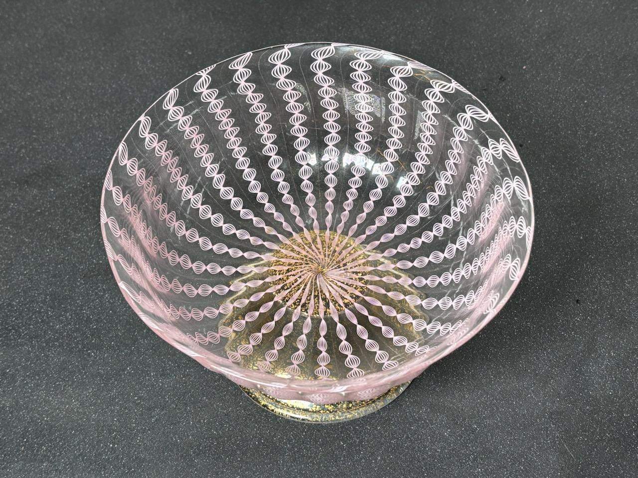 Murano Glass Centerpiece Cup by Paolo Venini. Signed under the base and with original label.

Biography
Paolo Venini was an Italian glass designer, important for his propagation of Murano glass and 20th-century glassware design. Born in 1895 in