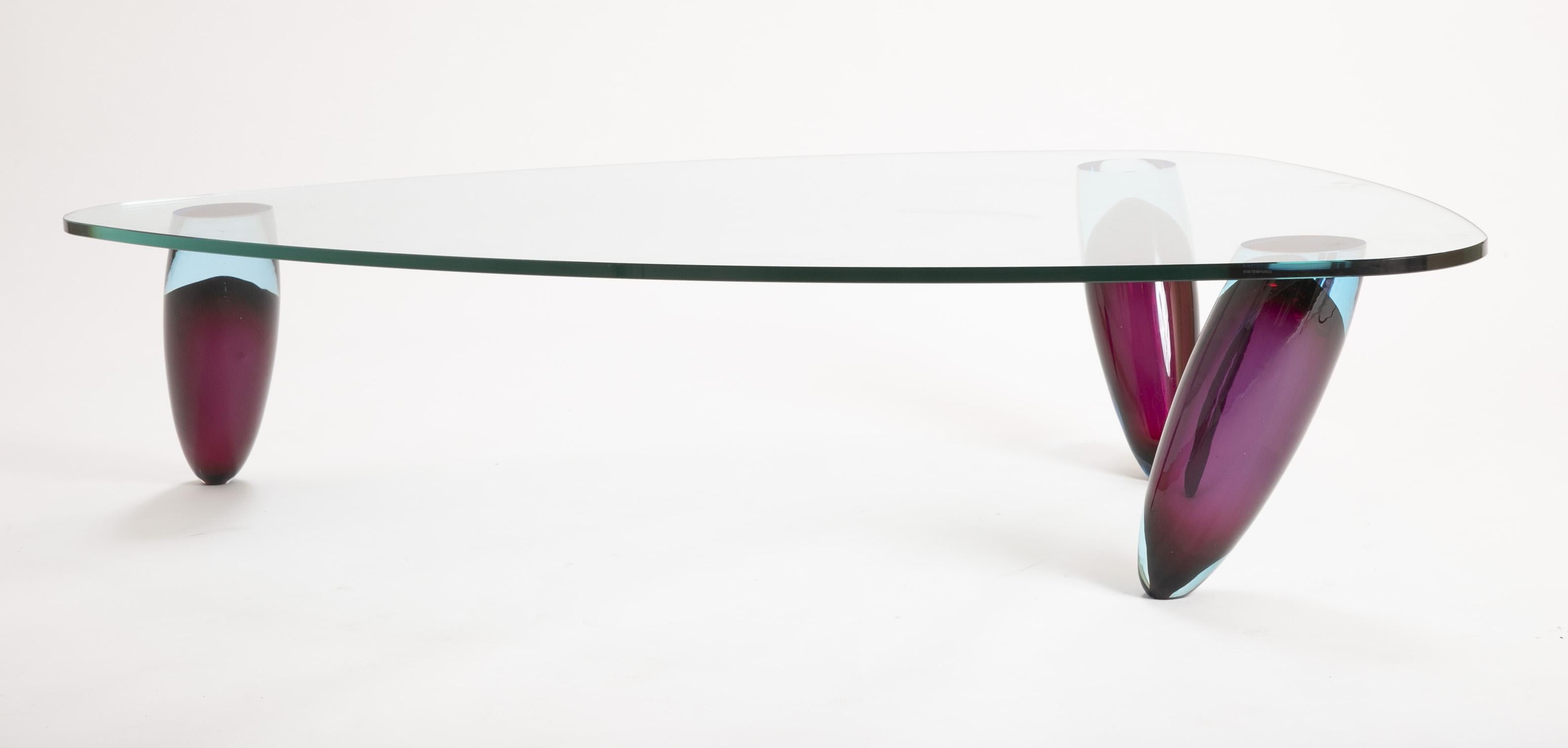A beautiful Italian Murano glass coffee table with Sommerso glass legs by Maurice Barilone for Roche Bobois.