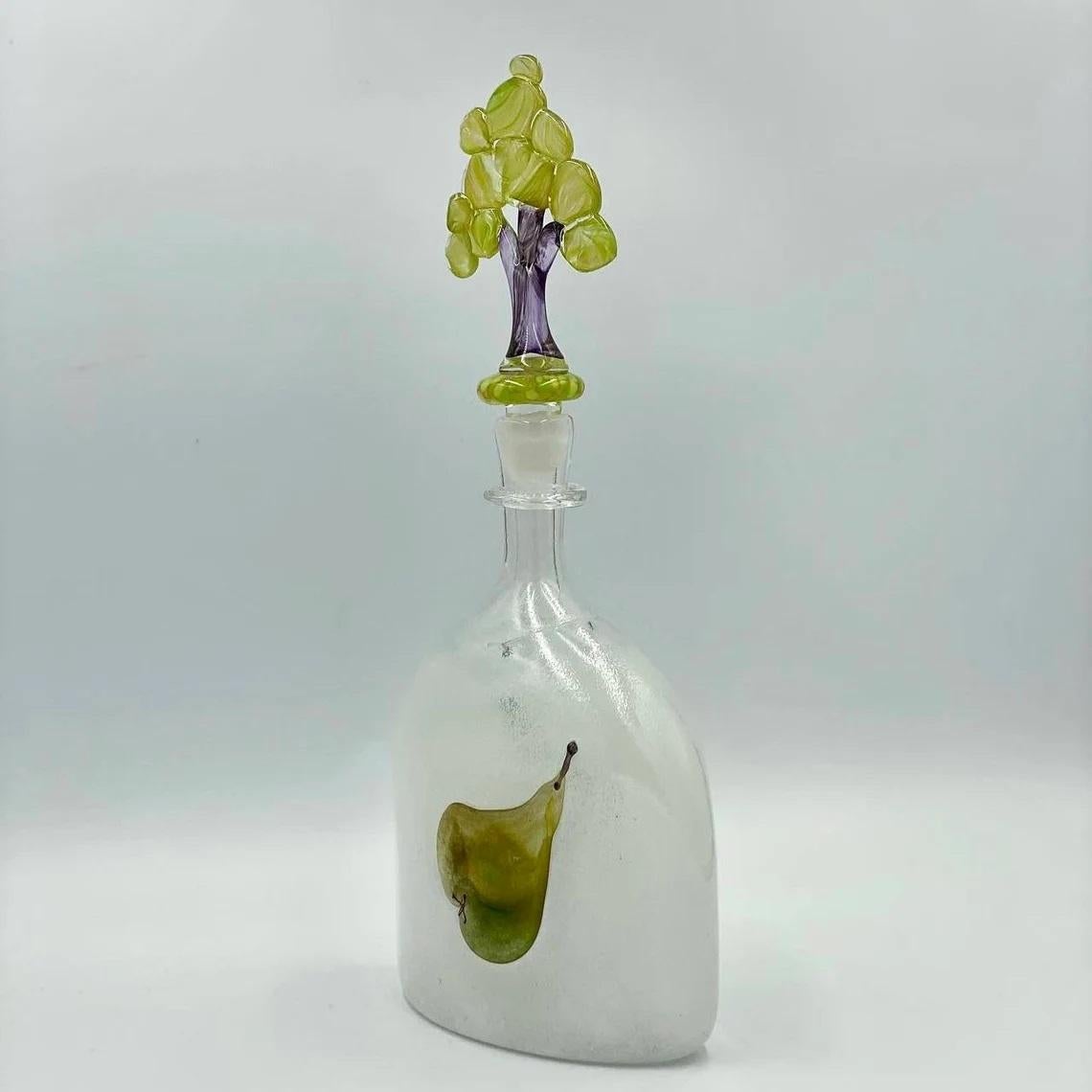 Rare Beautiful Decanter with Glass Stopper in the shape of Tree.

This Decanter made in Venice, Murano.

Made of Murano Glass.

Vintage.

In excellent condition, no chips, cracks or crazing.

Dimensions:

Height with Stopper - 13.4 in 34