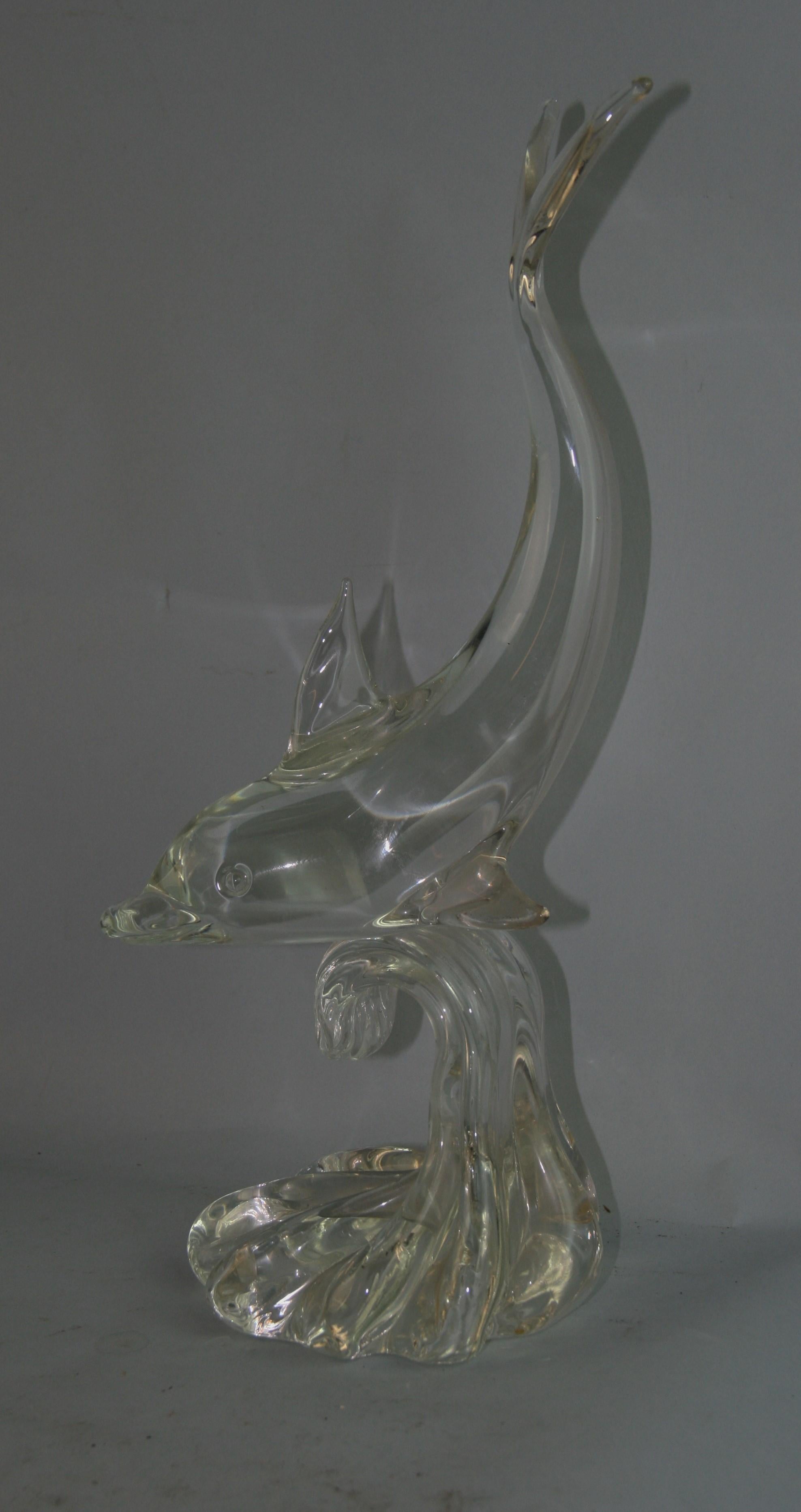 1274 This beautiful Italian Murano glass dolphin is hand crafted.
With original Murano label and signed B.R. 83.