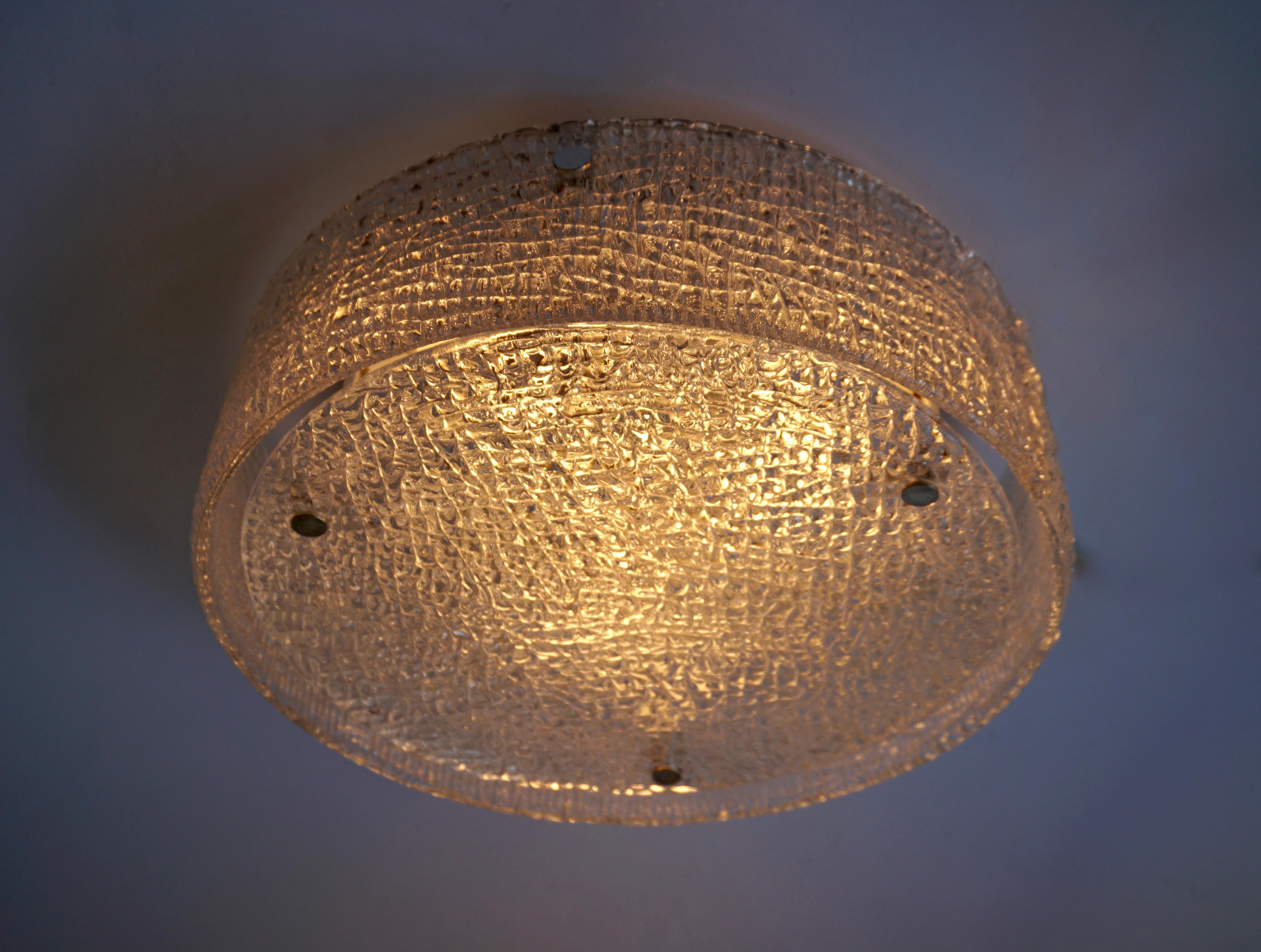 Italian Murano glass flushmount light.
Measures: 
Diameter 40 cm.
Height 15 cm.
Three E27 bulbs.