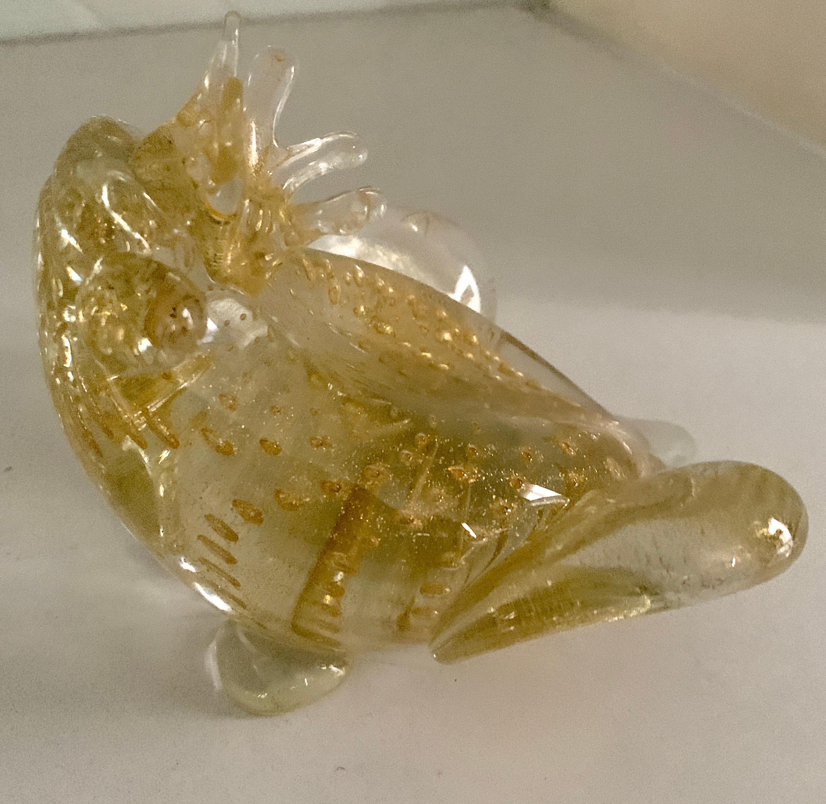 A delightful hand made Murano Glass Frog wearing a crown. Kissing this frog may not reveal a handsome prince, but it will make your cocktail table, side table or desk more appealing... the piece has accents of authentic gold flecks inside making it