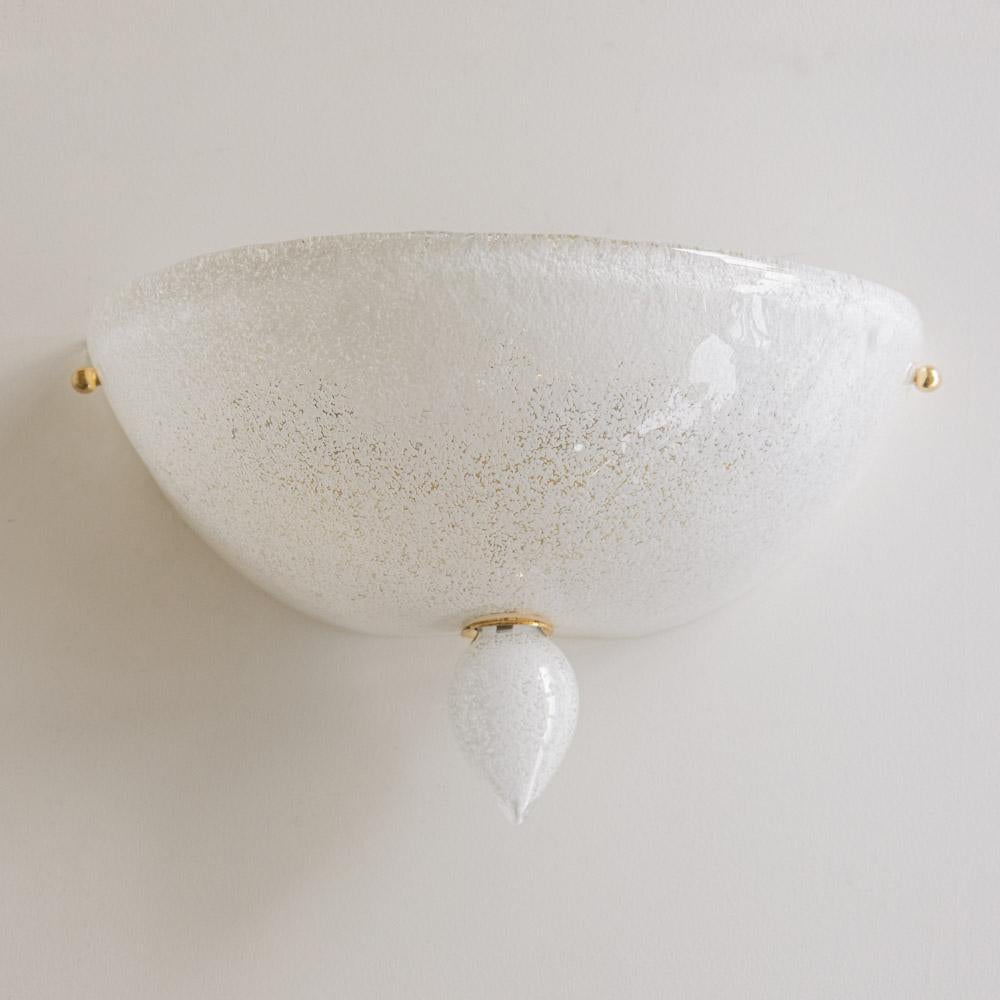 Beautiful Murano blown glass sconce from Italy, 1950s. White Murano glass semi-dome shaped sconce with glass teardrop and brass detail. Newly re-wired with single socket and original brass backplate. Takes one E12 base bulb, 25 W or higher using