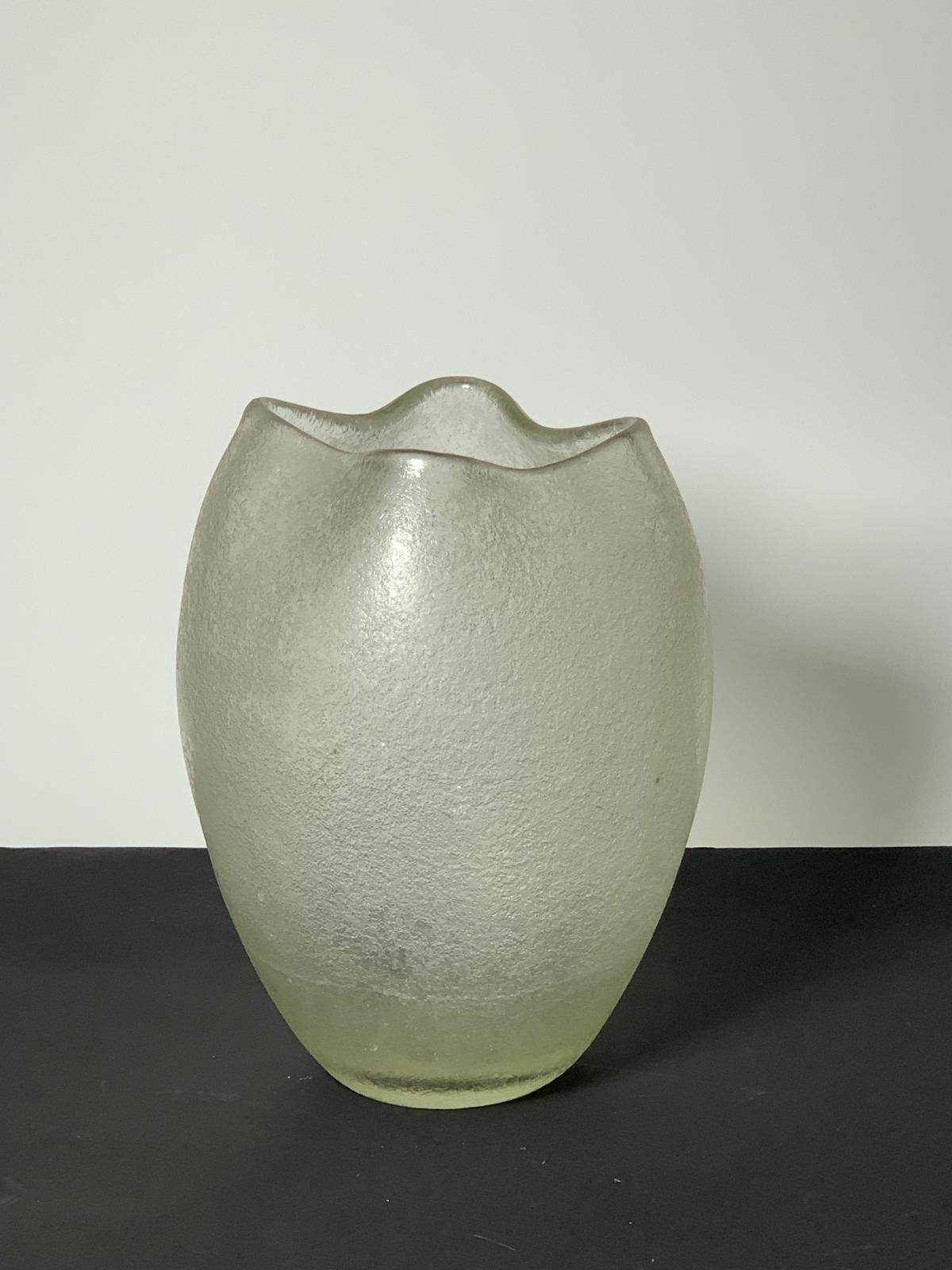 Murano glass vase from the Corroso series designed by Flavio Poli for Seguso in the 1940s.

Biography
Designer, businessman, ceramic artist. Born in Chioggia, he attended the Istituto d'Arte di Venezia and began work as a designer in ceramics. in