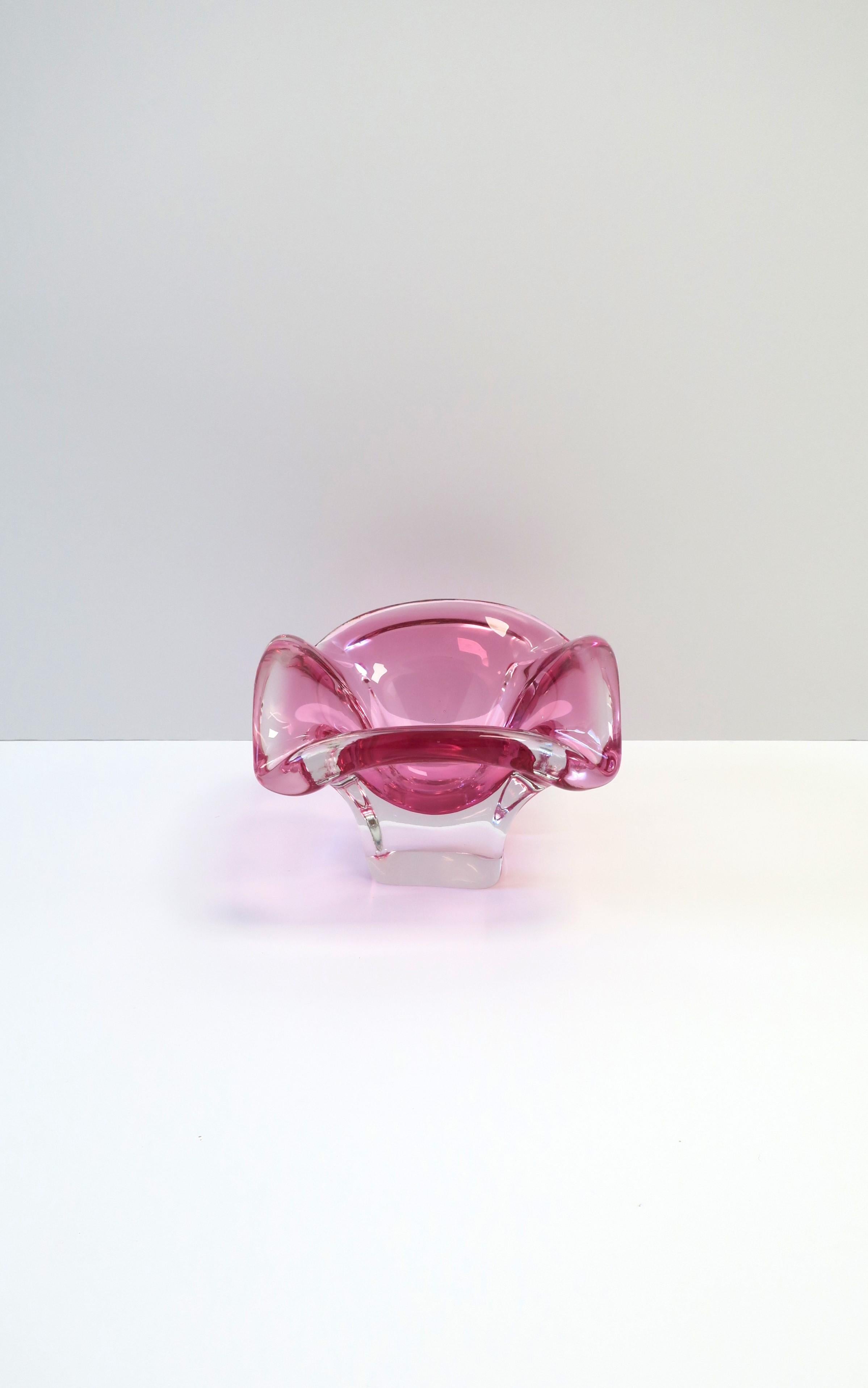 A substantial Italian Murano transparent/clear and pink art glass bowl or ashtray, circa mid-20th century, Italy. Bowl has a pedestal design, soft corners, and intendents to support a tobacco product. Bowl appears to have never been used. Beautiful