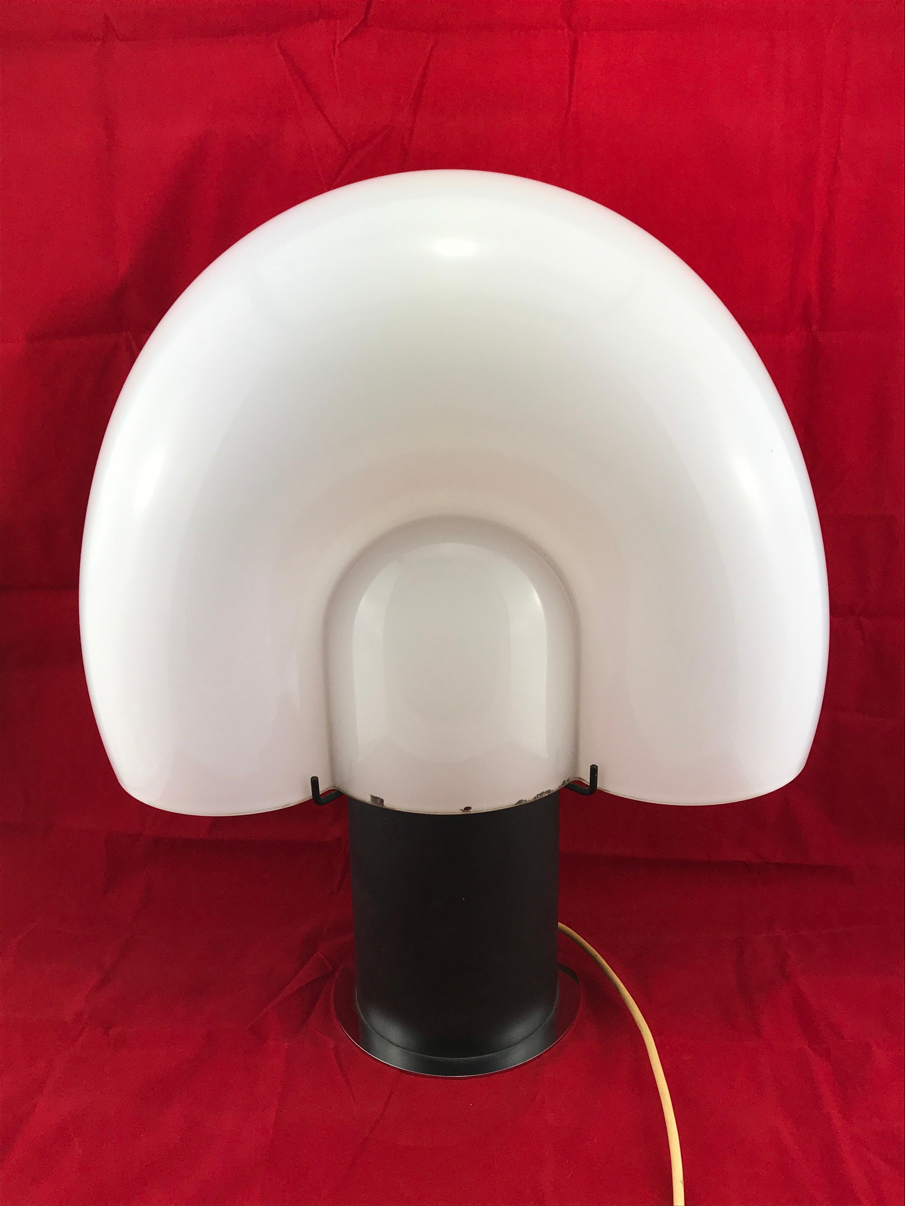 Mid-Century Modern table lamp with the top in Murano glass and base in mat black metal base.