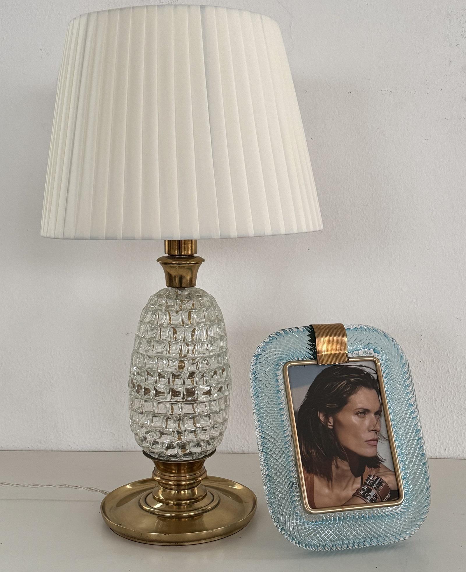 Italian Murano Twist Glass Picture Frame in light blue color in Barovier & Toso Style

Italian Modern Murano twist glass and brass picture frame, in sky blue color.
Suits for 18x12cm or 5x7