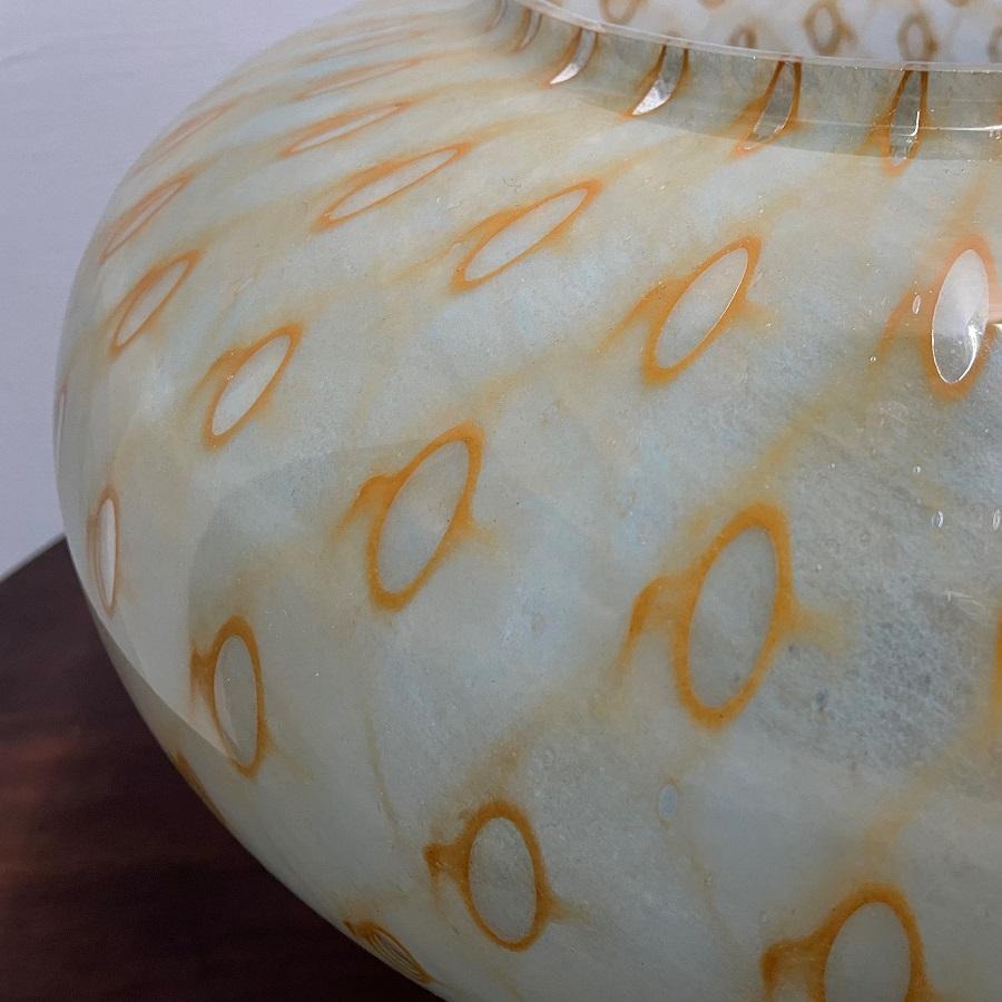 Italian Murano vase attributed to Barovier e Toso. The vase has nice colorful circles and swirl pattern.