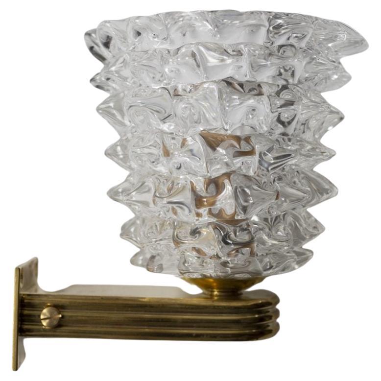 Italian Murano Wall Sconces made by eModerno, meticulously created in Italy to meet the highest standards of quality.
The Rostrato bowls rest on brass outstretched reeded arm.
Made by hand in Venice, each sconce is unique and there are slight