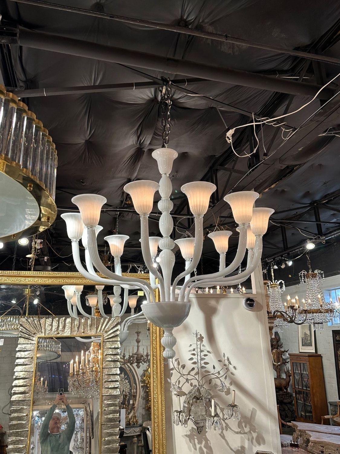 Large scale modern Italian Murano white glass 12-arm chandelier. Circa 2000. The chandelier has been professionally re-wired, cleaned and is ready to hang. Includes matching chain and canopy.