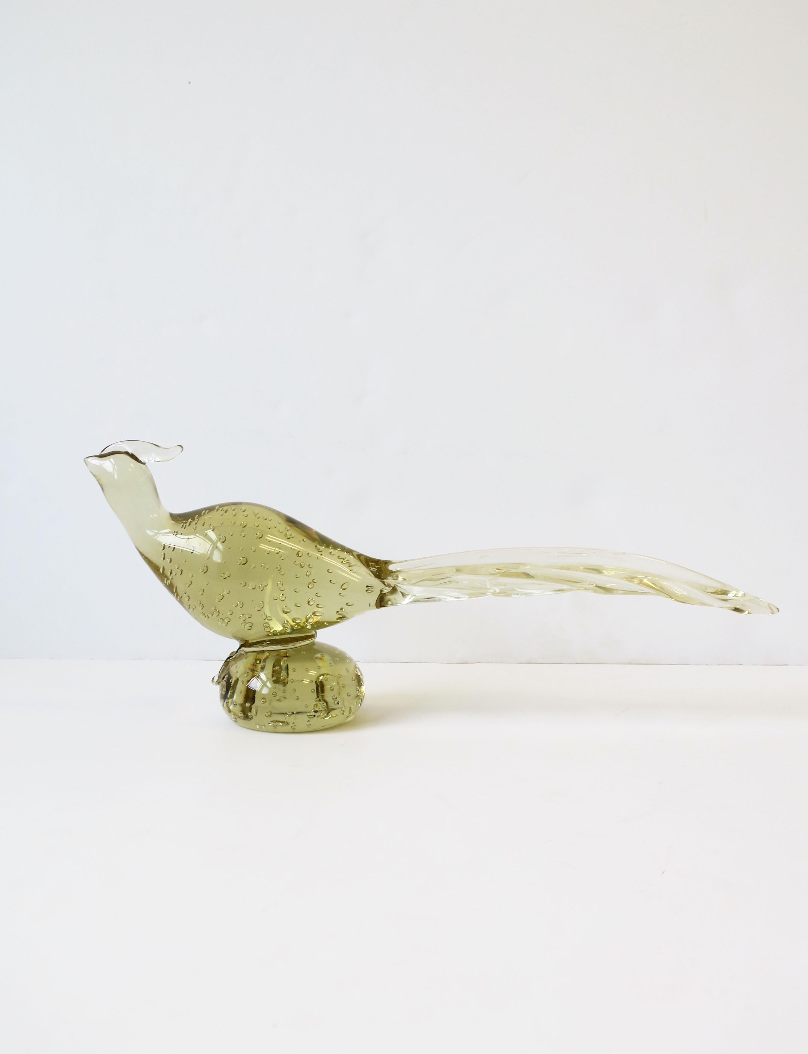 A beautiful, substantial and relatively large Midcentury Modern Italian Murano art glass pheasant bird sculpture attributed to Italian designer Archimede Seguso, circa mid-20th century, 1960s, Italy. Pheasant bird is a light yellow/ginger ale hue