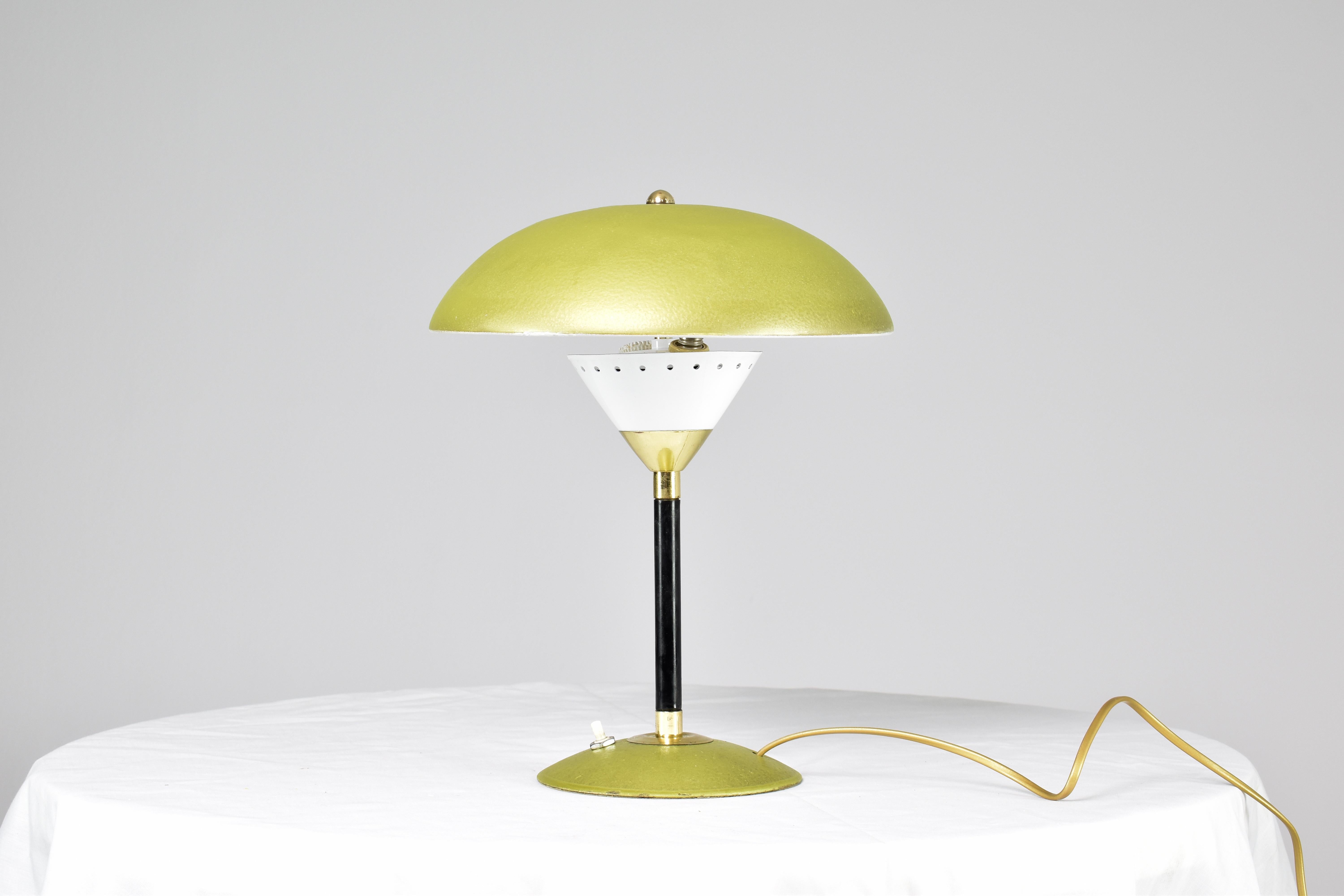 A stylish mushroom-style table lamp with perforated metal details and gold and white tones. 
The design features a push-type button on the base. 

This piece is professionally re-wired with the highest standards and is universally compatible. 
E27