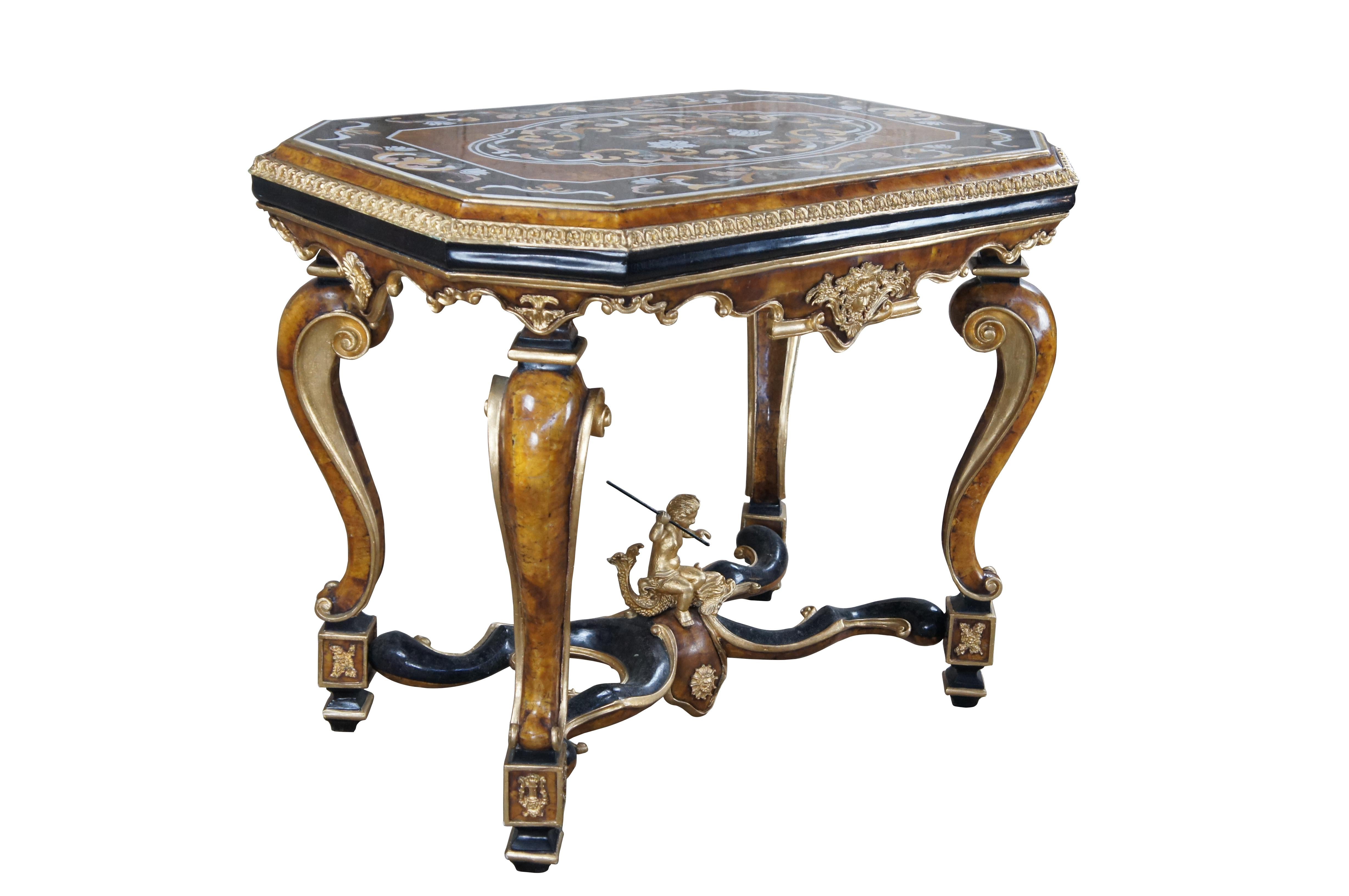 Monumental Italian Napoleon III inspired salon, center or console table. Having a octagonal formed exotic pietra dura marble inlaid top with pen shell and stone inlays. Features a carved gilt molding resting on 