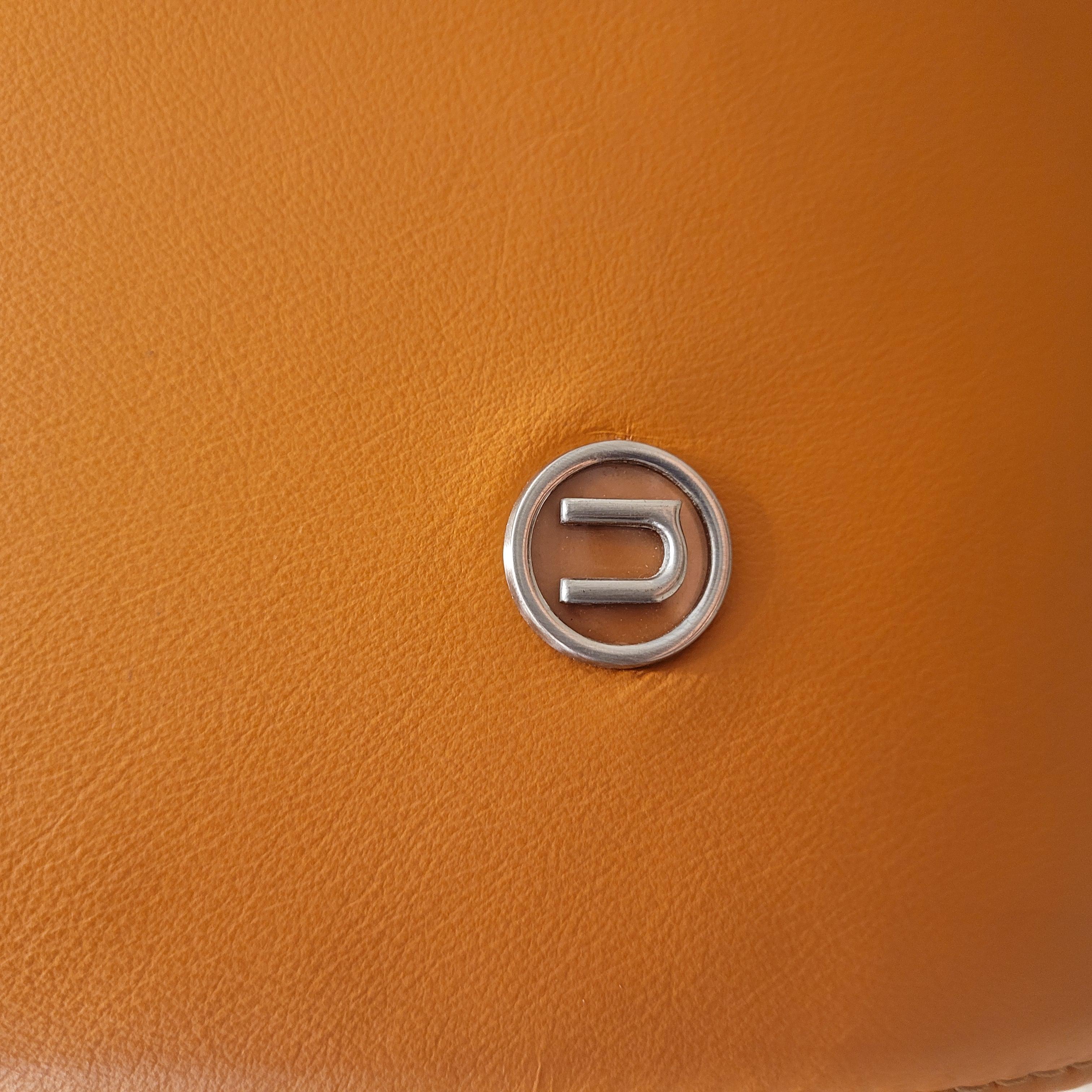 Italian Natuzzi Orange “Suad” swivel armchair, orange leather For Sale 3