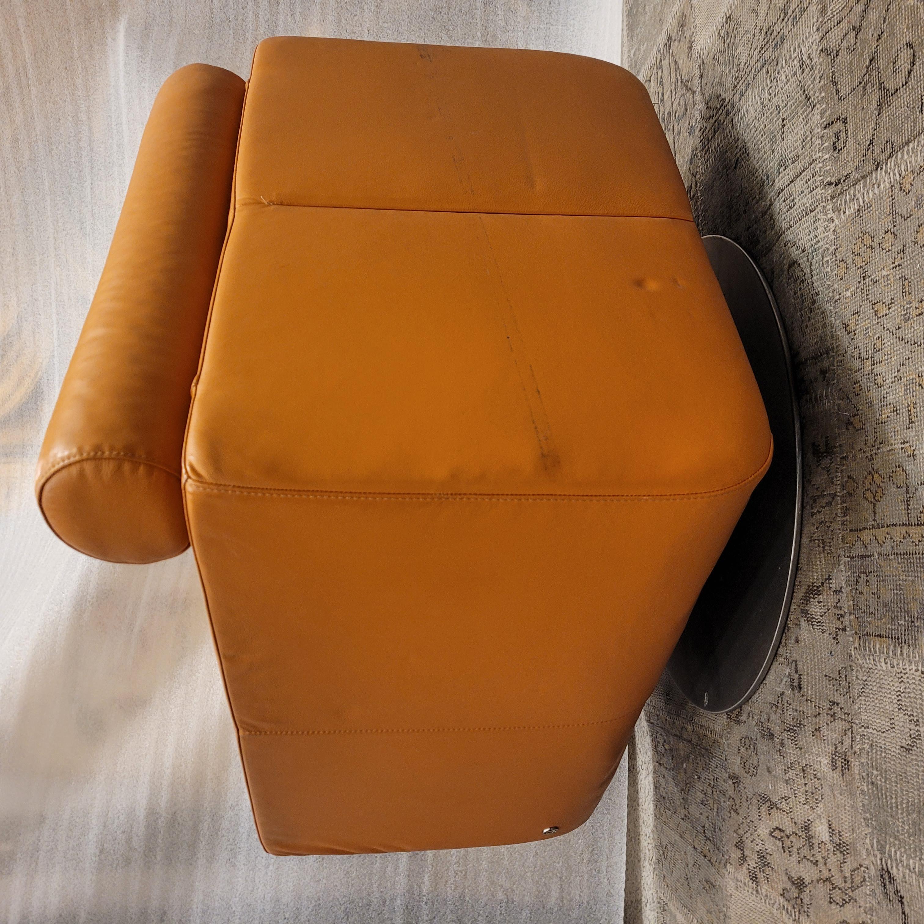 Italian Natuzzi Orange “Suad” swivel armchair, orange leather For Sale 5