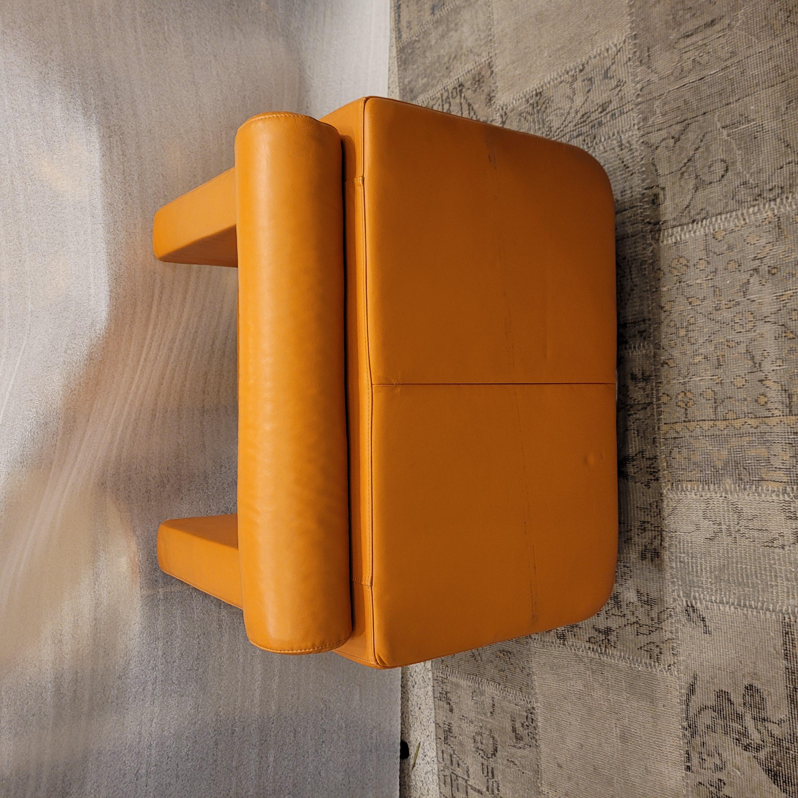 Italian Natuzzi Orange “Suad” swivel armchair, orange leather For Sale 6