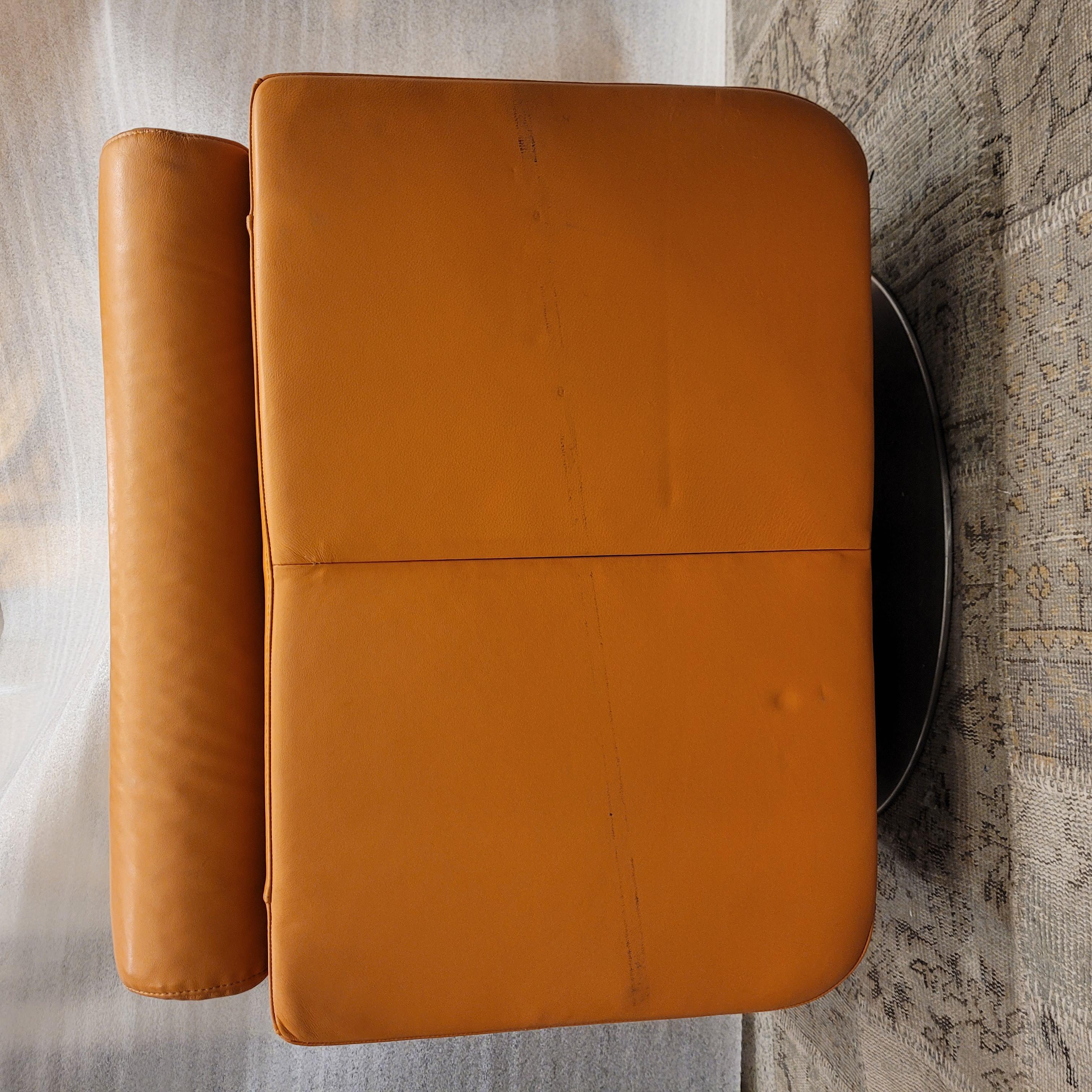 Italian Natuzzi Orange “Suad” swivel armchair, orange leather For Sale 7