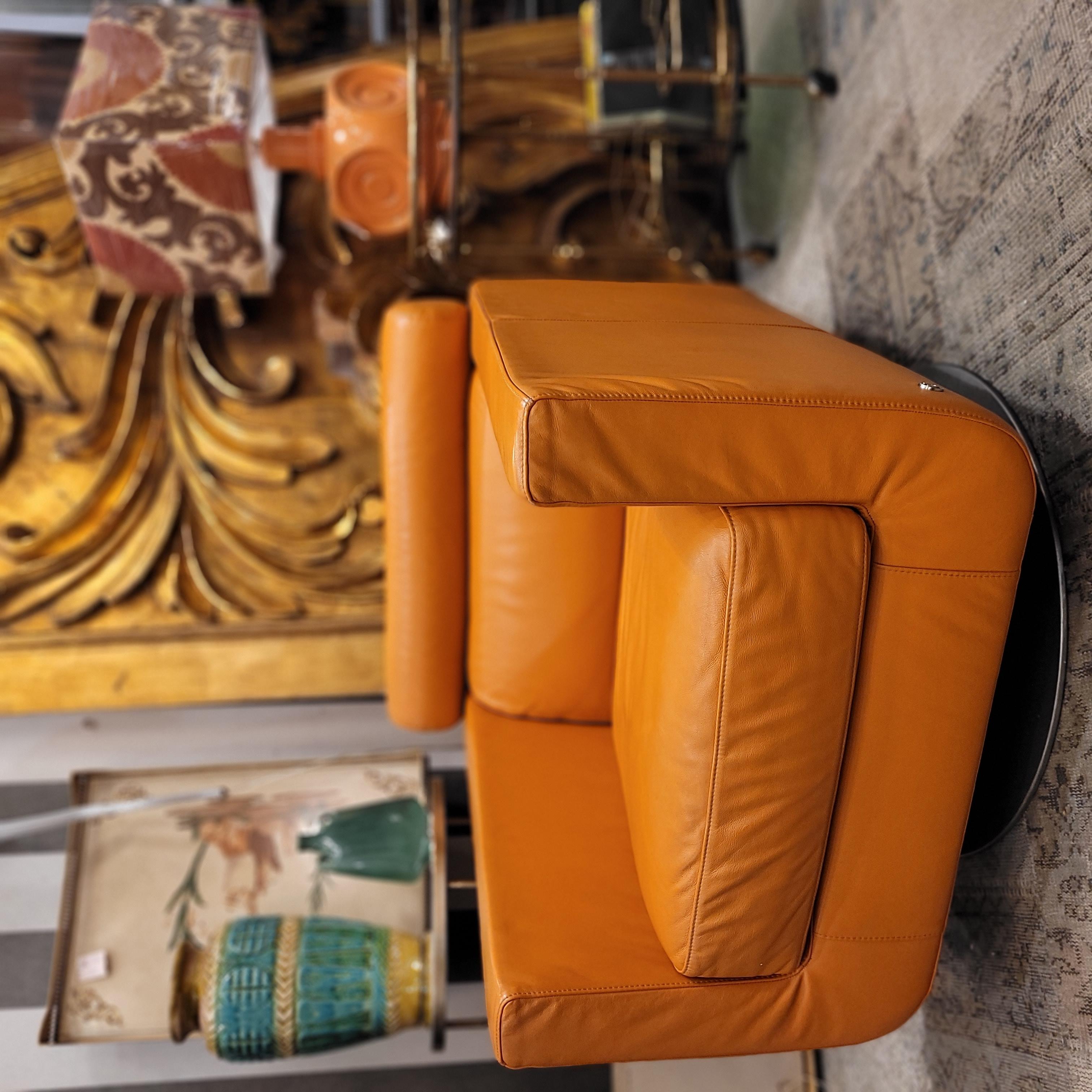 Italian Natuzzi Orange “Suad” swivel armchair, orange leather For Sale 11