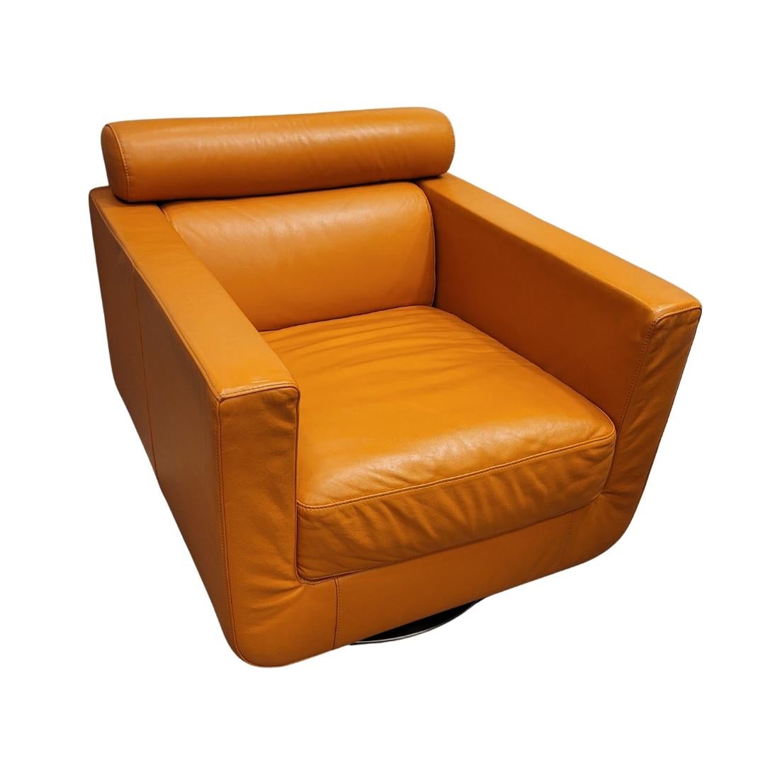 Italian Natuzzi Orange “Suad” swivel armchair, orange leather For Sale 13