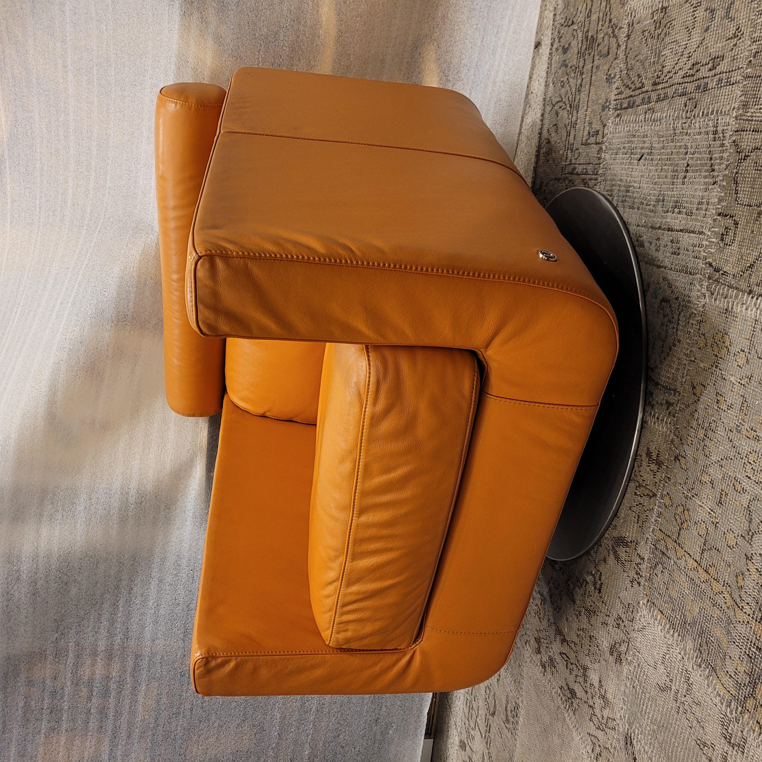 Steel Italian Natuzzi Orange “Suad” swivel armchair, orange leather For Sale