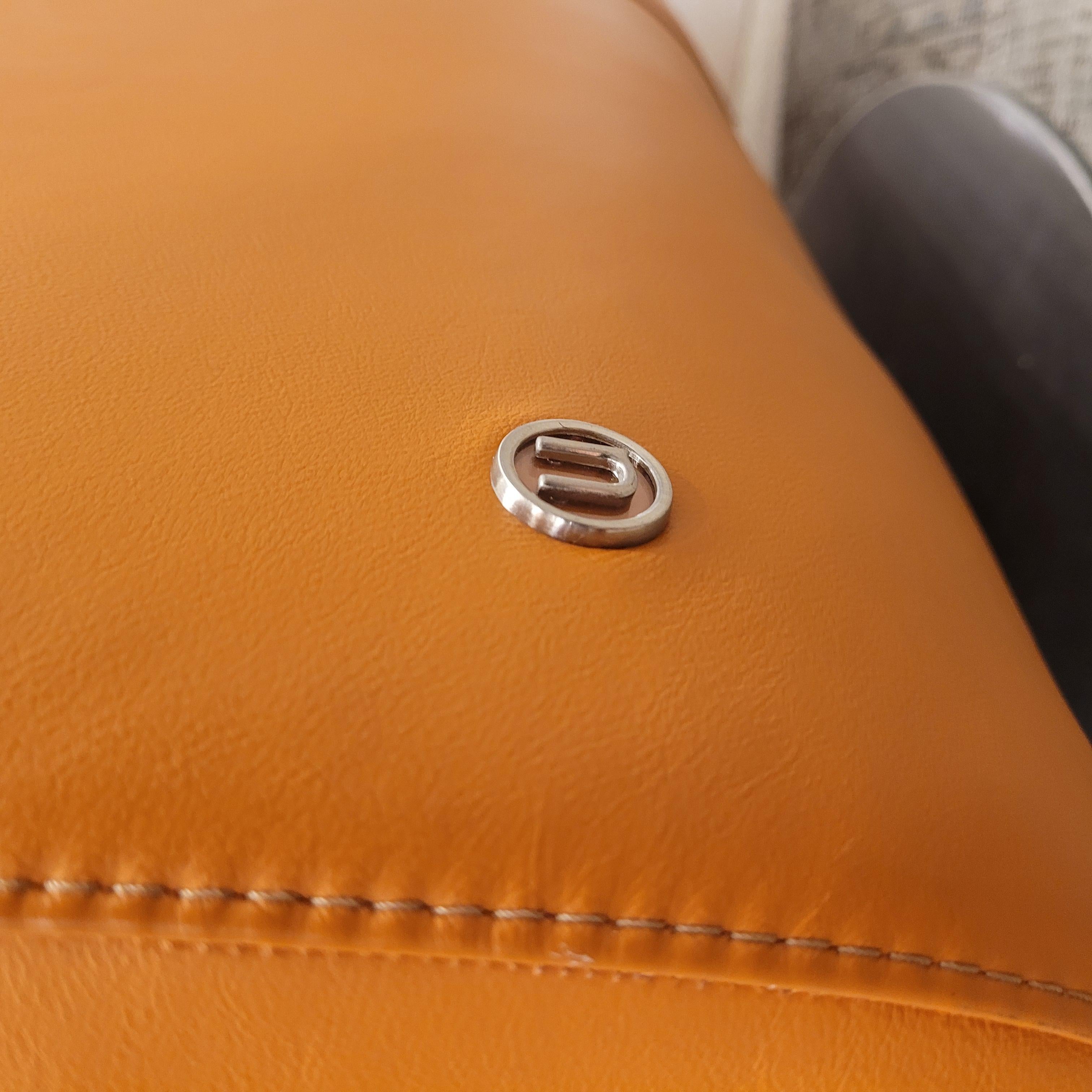 Italian Natuzzi Orange “Suad” swivel armchair, orange leather For Sale 2