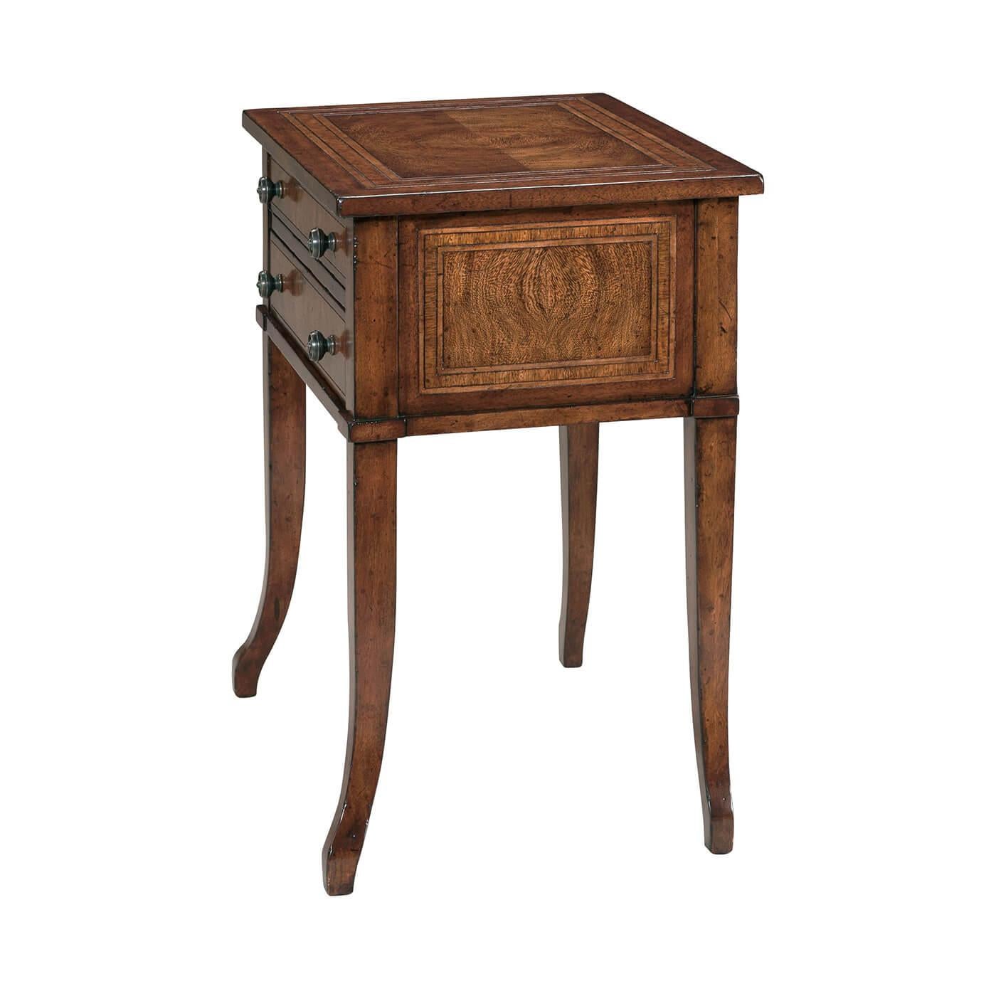 An Italian Neo-Classic style mahogany end table, the rectangular crossbanded top above two graduated drawers, on splayed legs. 

Dimensions: 22