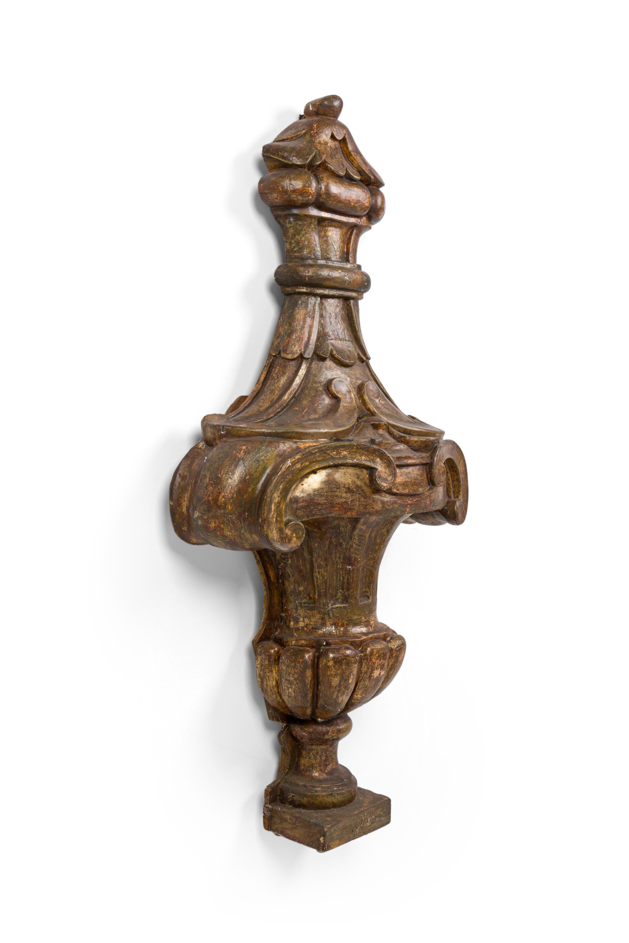 Italian Neo-classic (18th Century) monumental gilt carved wall plaque / ornament having an urn shaped form

Pitting, cracks; wear consistent with age and use.