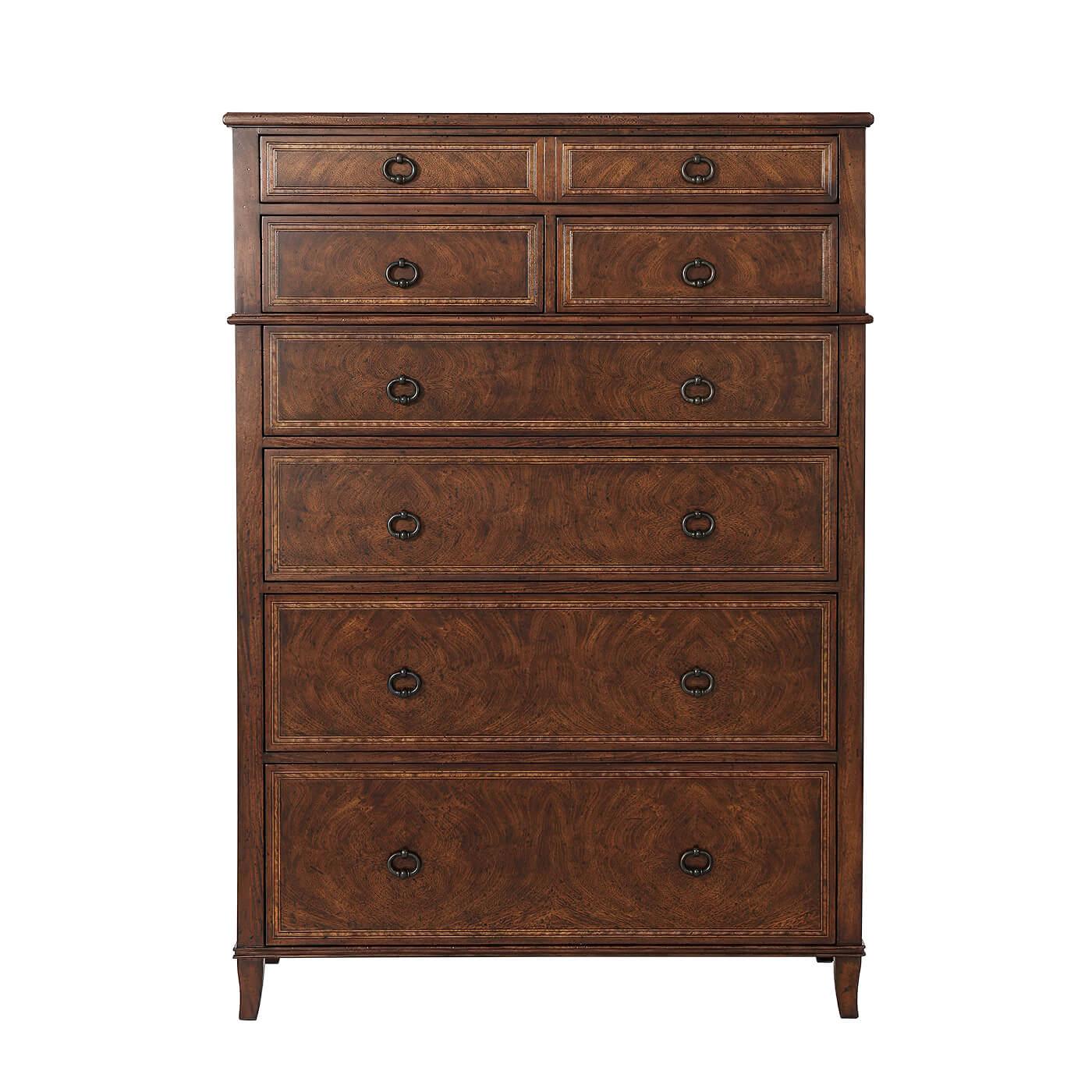An Italian Neoclassic styler mahogany Gentleman's chest of drawers, the rectangular top above one long drawer, two short drawers and four graduated long drawers, on splayed legs. 

Dimensions: 44
