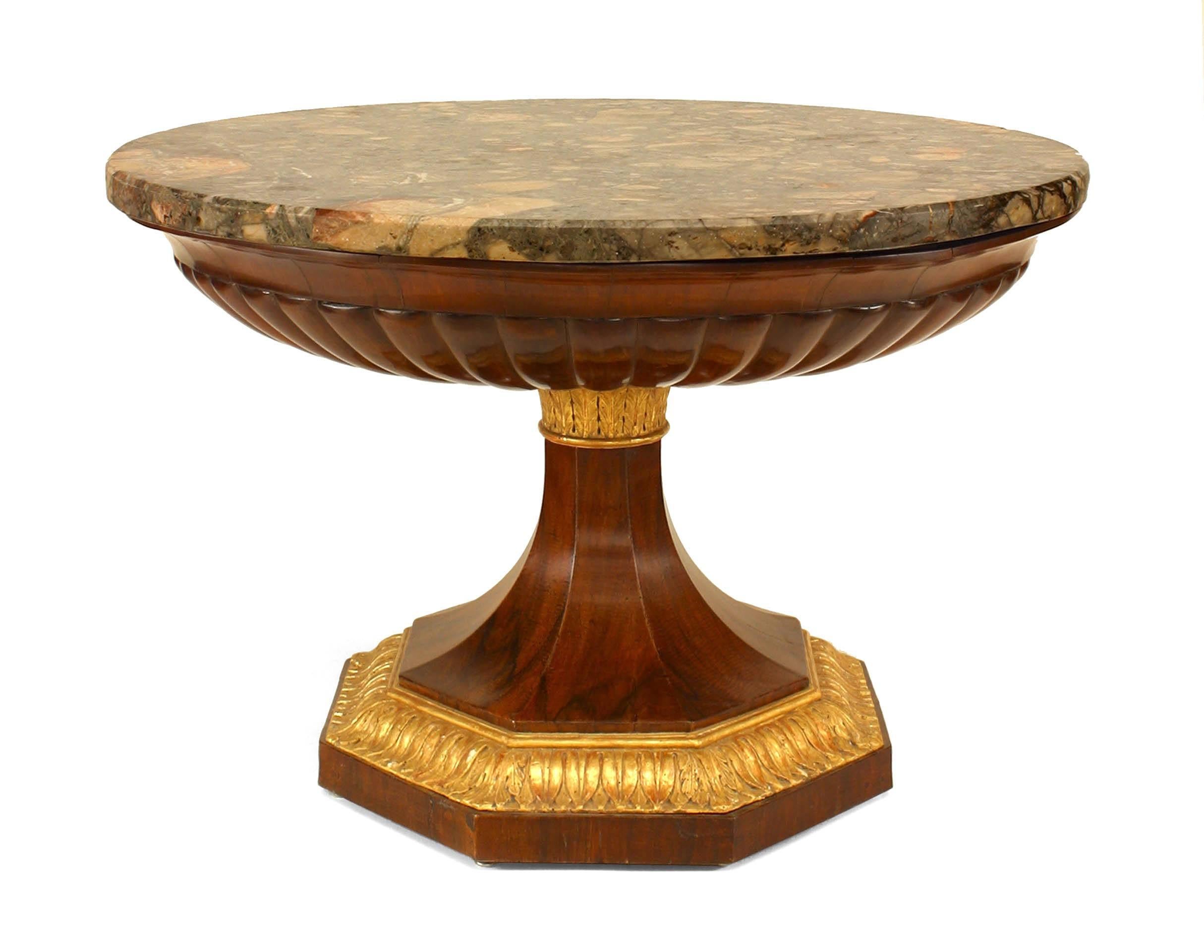 Italian Neapolitan neo-classic (circa 1820) walnut pedestal form center table with fluted basin and gilt carved trim supported on an octagonal base with a round Breccia marble top.
   