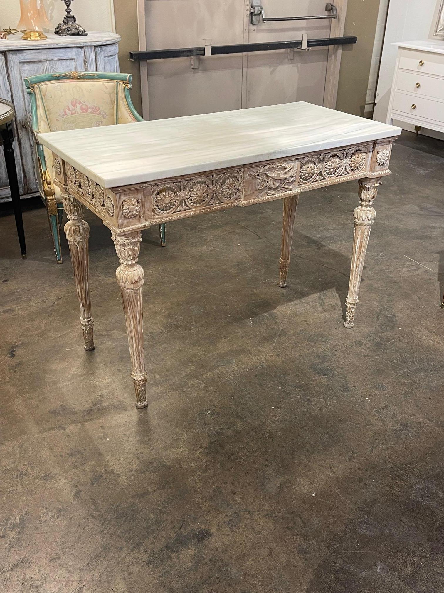 19th century Italian Neo-Classical carved and white-washed console with marble top, Circa 1870. Nicely carved with a beautiful patina. A fine addition to any home.