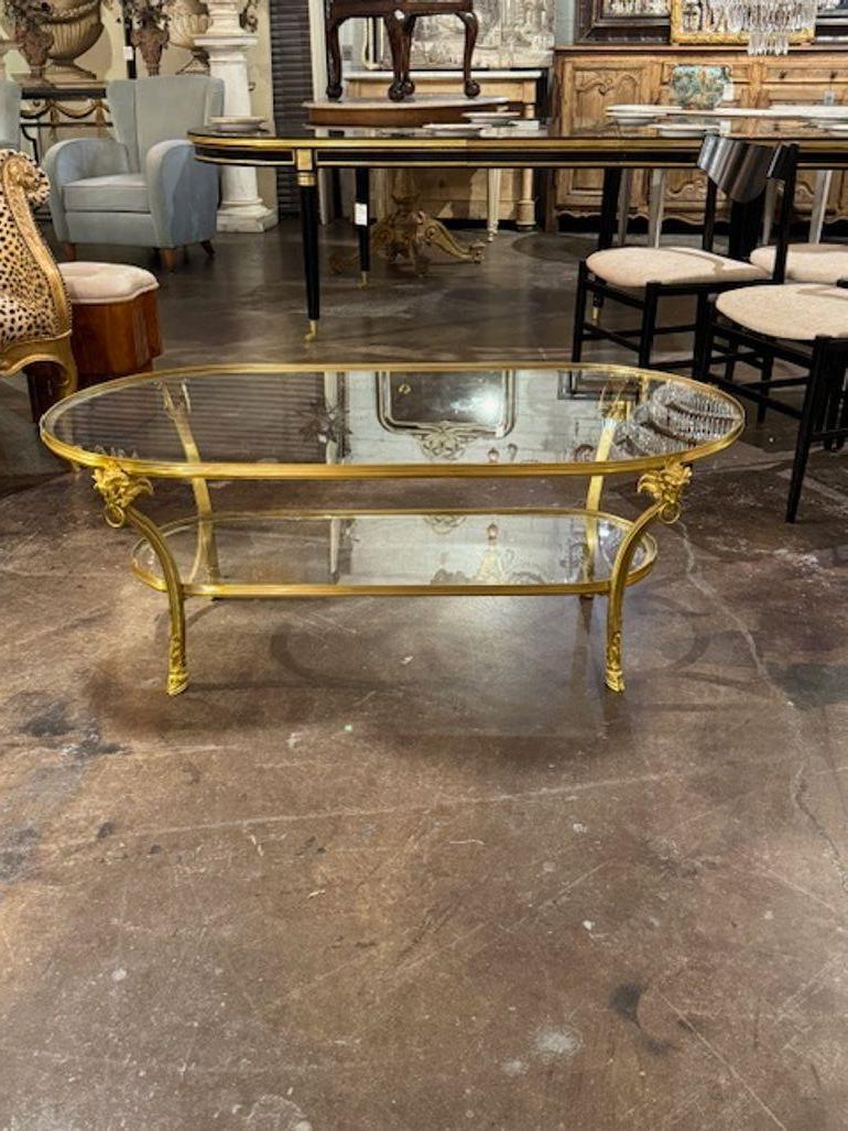Table basse néo-classique en laiton doré de la Maison Bagues. Cira 2000. Une déclaration qui ne passera pas inaperçue ! 48w x 25d x 18h