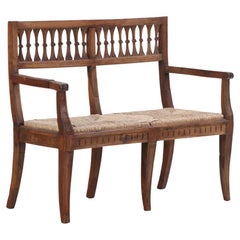 Italian Neo-classical style carved walnut bench, late 18th C.
