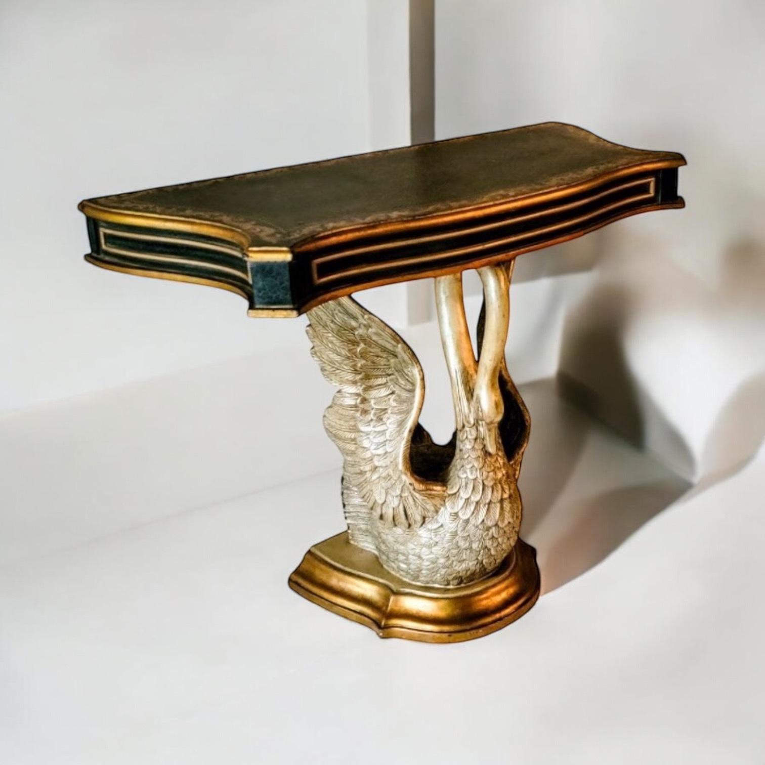 This is a 20th century Italian neo-classical style swan form console table . The top is a tooled leather, and the body is both wood and composition. It is in very good condition and unmarked. 

Shipping is running two to five weeks. If your
