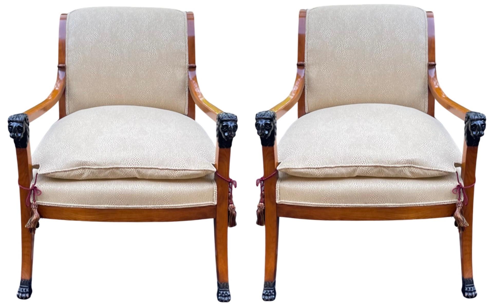 This is a pair of walnut and ebony arm chairs with neo-classical style frames. The steak walnut almost gives them a Biedermeier look and feel. The vintage upholstery is in very good condition. They are unmarked. Arm; 25”. 

My shipping is for the