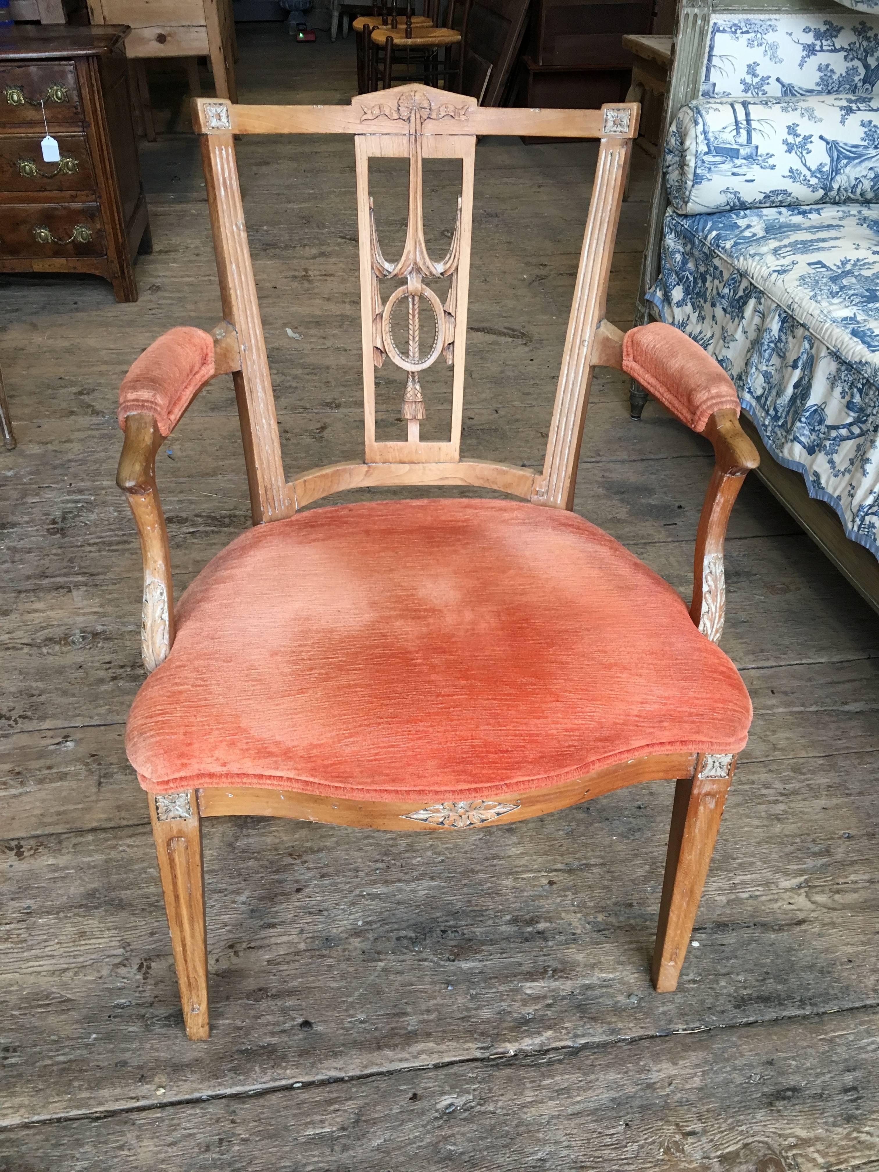 An mid-19th century Italian neoclassic armchair with carved lyre back and upholstered seat, circa 1840-1860.