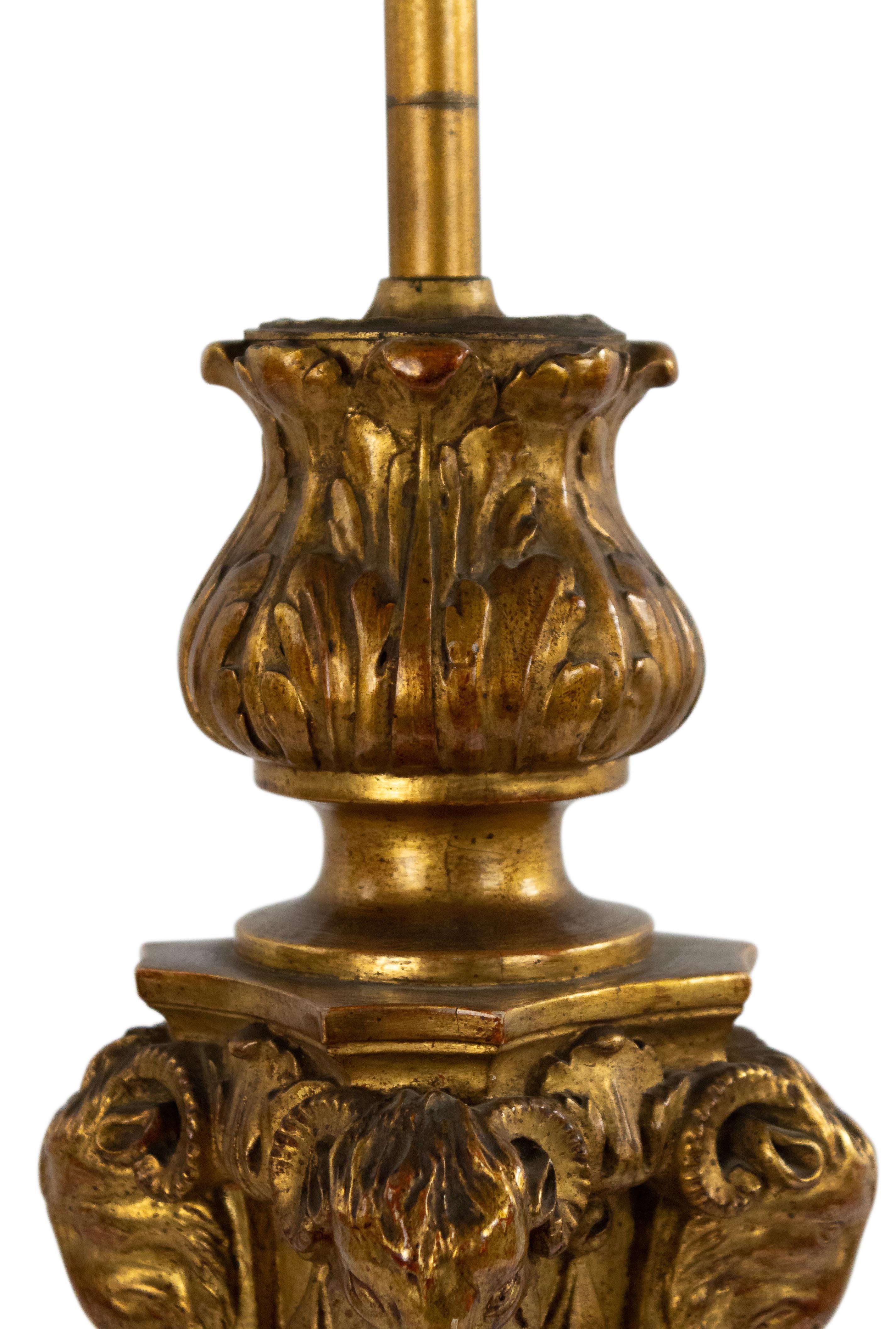 Italian neoclassic (20th century) carved giltwood lamp with ram's head and acanthus leaf details.
