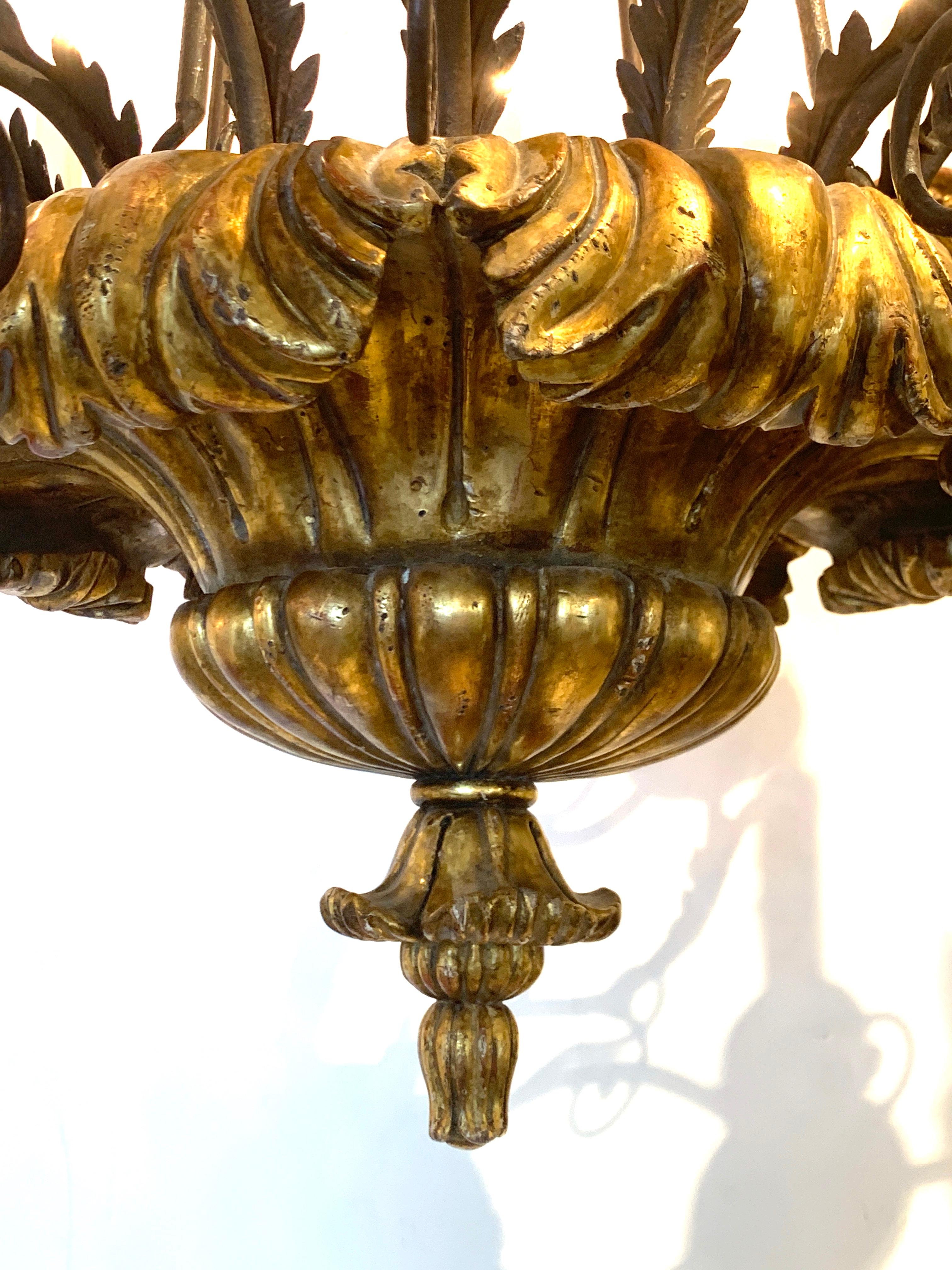Italian Neoclassic Carved Giltwood and Iron 18-Light Chandelier 3
