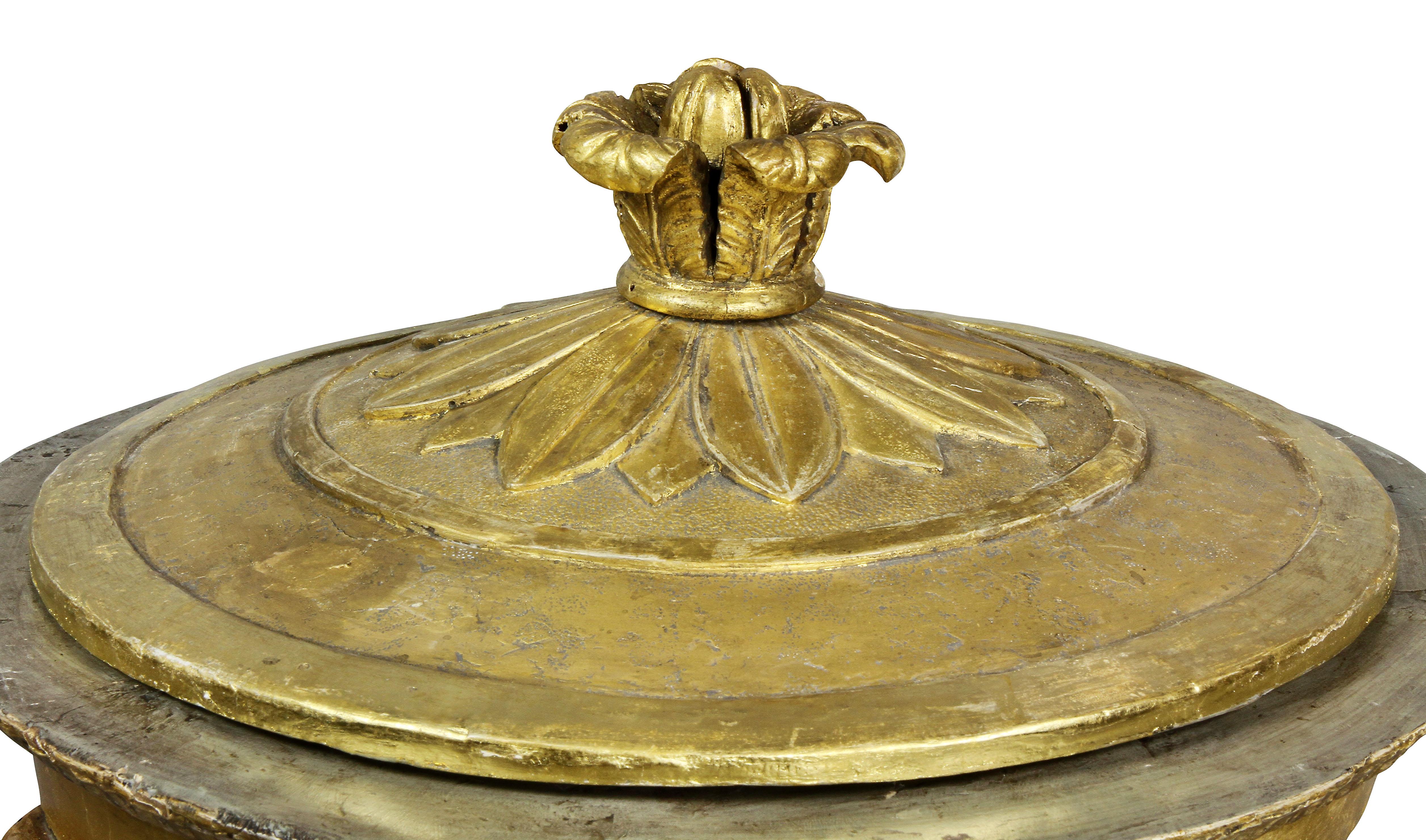 With removable dome cover with leaf form finial, all raised on corinthian columns, conforming base with carved leaf tip decoration.