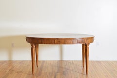 Italian Neoclassic Oval Marquetry Veneered 8 Drawer Library Table, early 19thc.