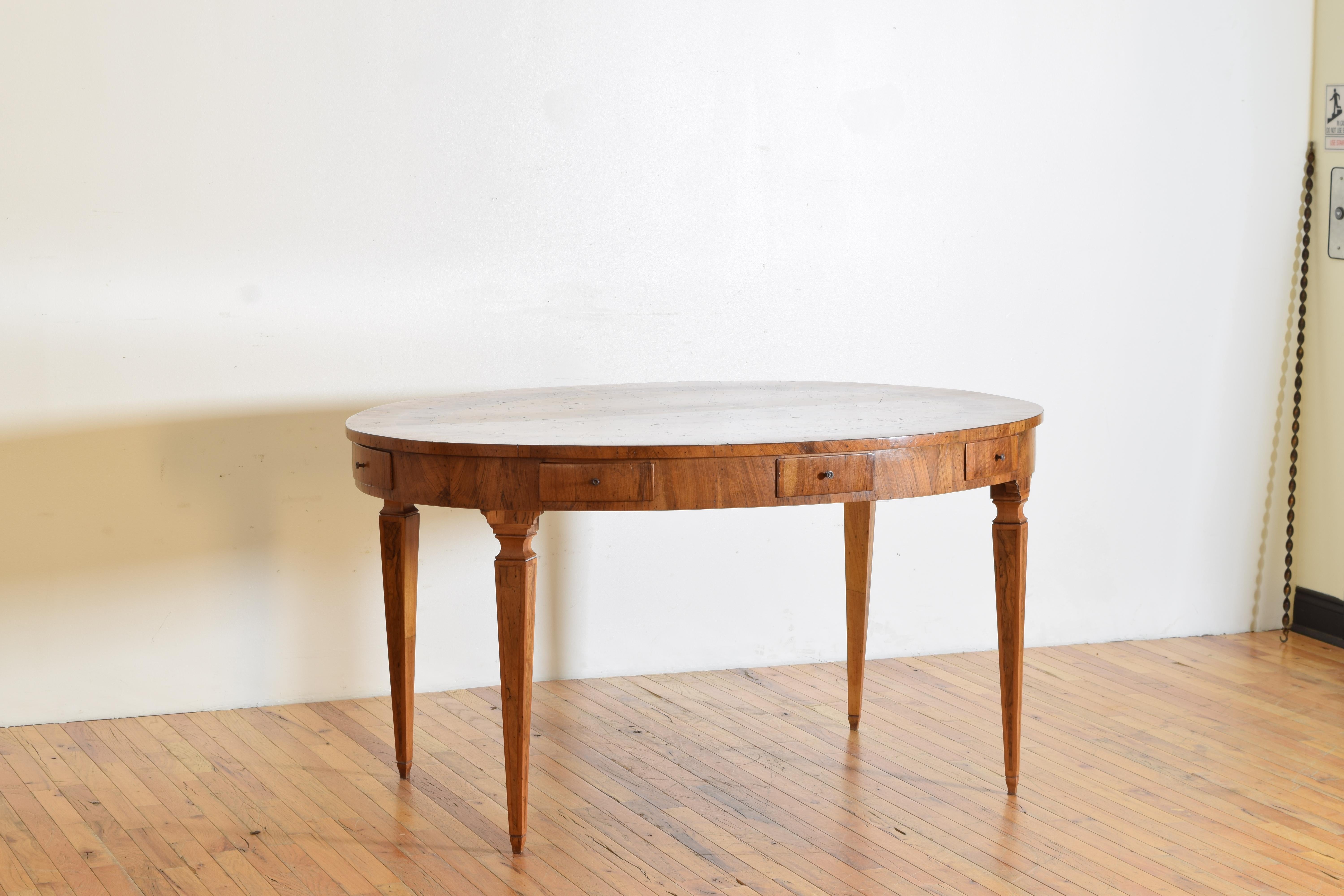 Neoclassical Italian Neoclassic Oval Marquetry Veneered 8 Drawer Library Table, early 19thc.