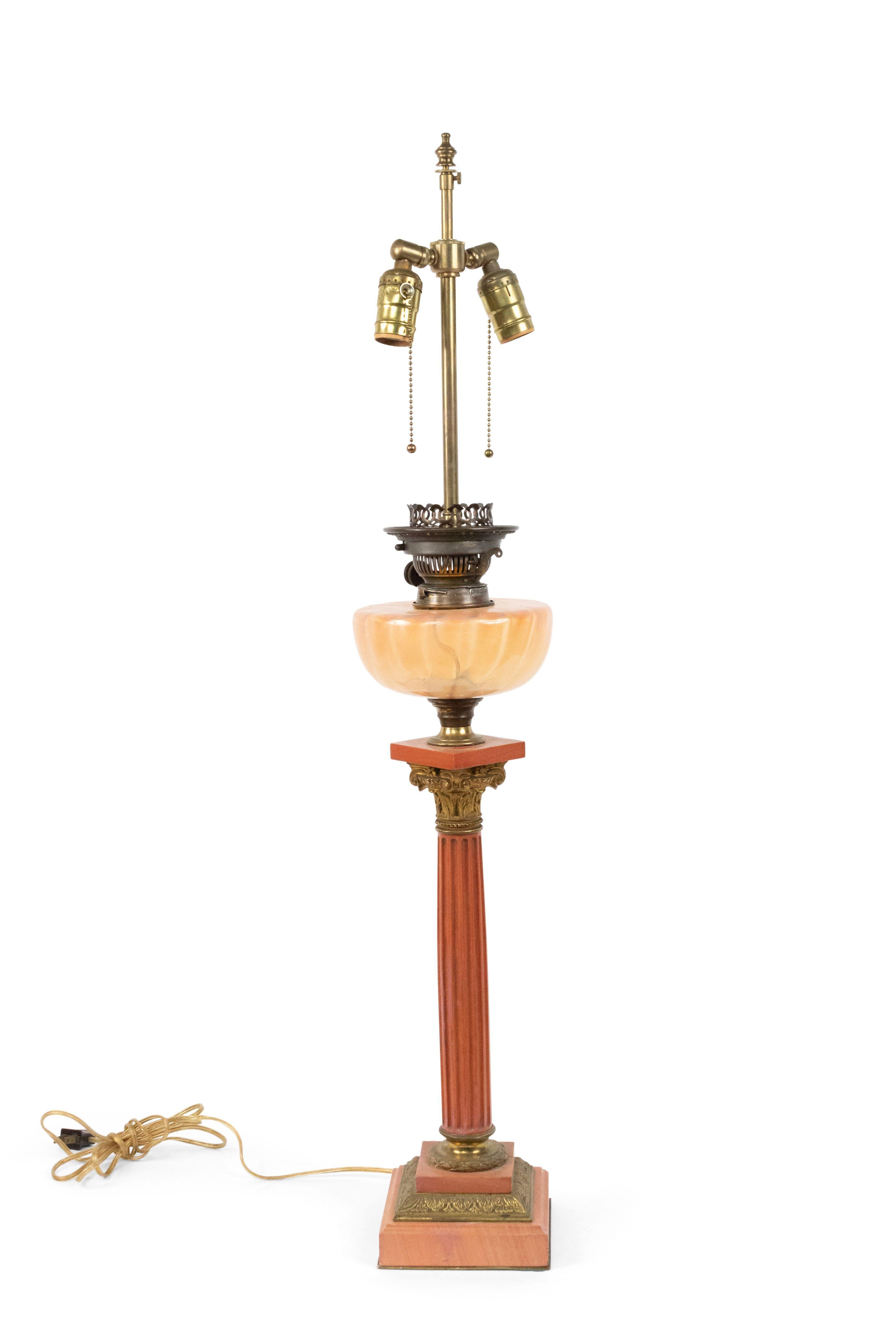 Italian Neo-classic style (19th Century) pink marble fluted column table lamp with bronze trim and font.
