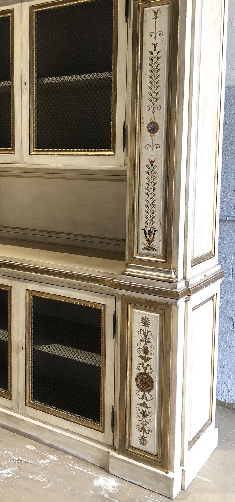 Italian Neoclassic Style Cream Painted and ParcelGilt Breakfront