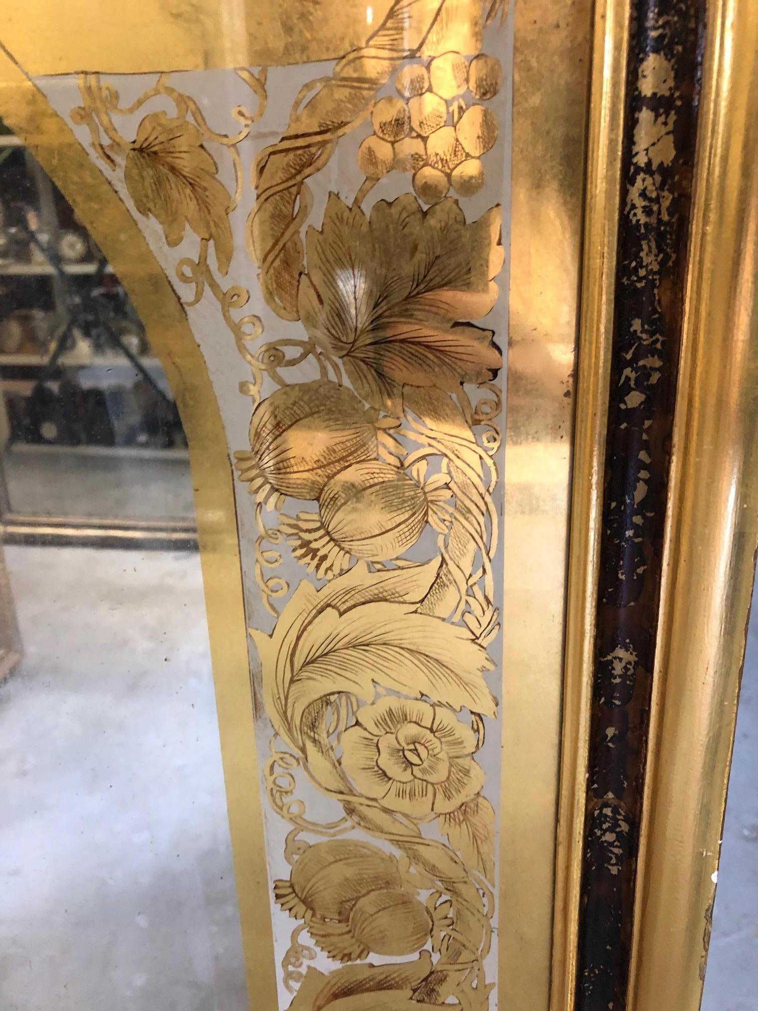 Italian Neoclassic Style Gold Églomisé Wall Mirror with Ornate Foliate Designs In Good Condition In New York, NY