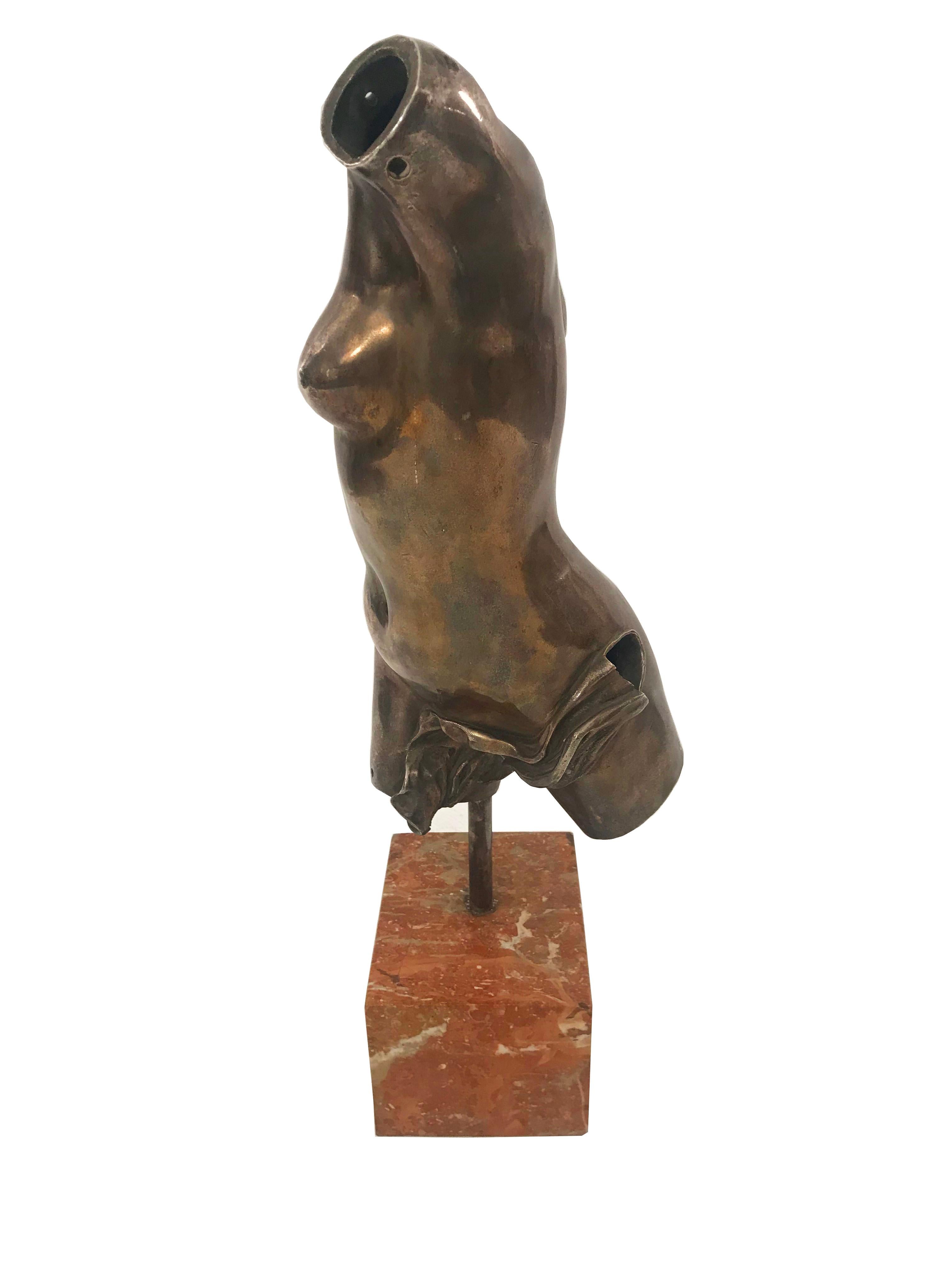 Italian Neo-Classic style (20th c.) silvered bronze sculpture of a nude torso mounted on a rouge square marble base.
