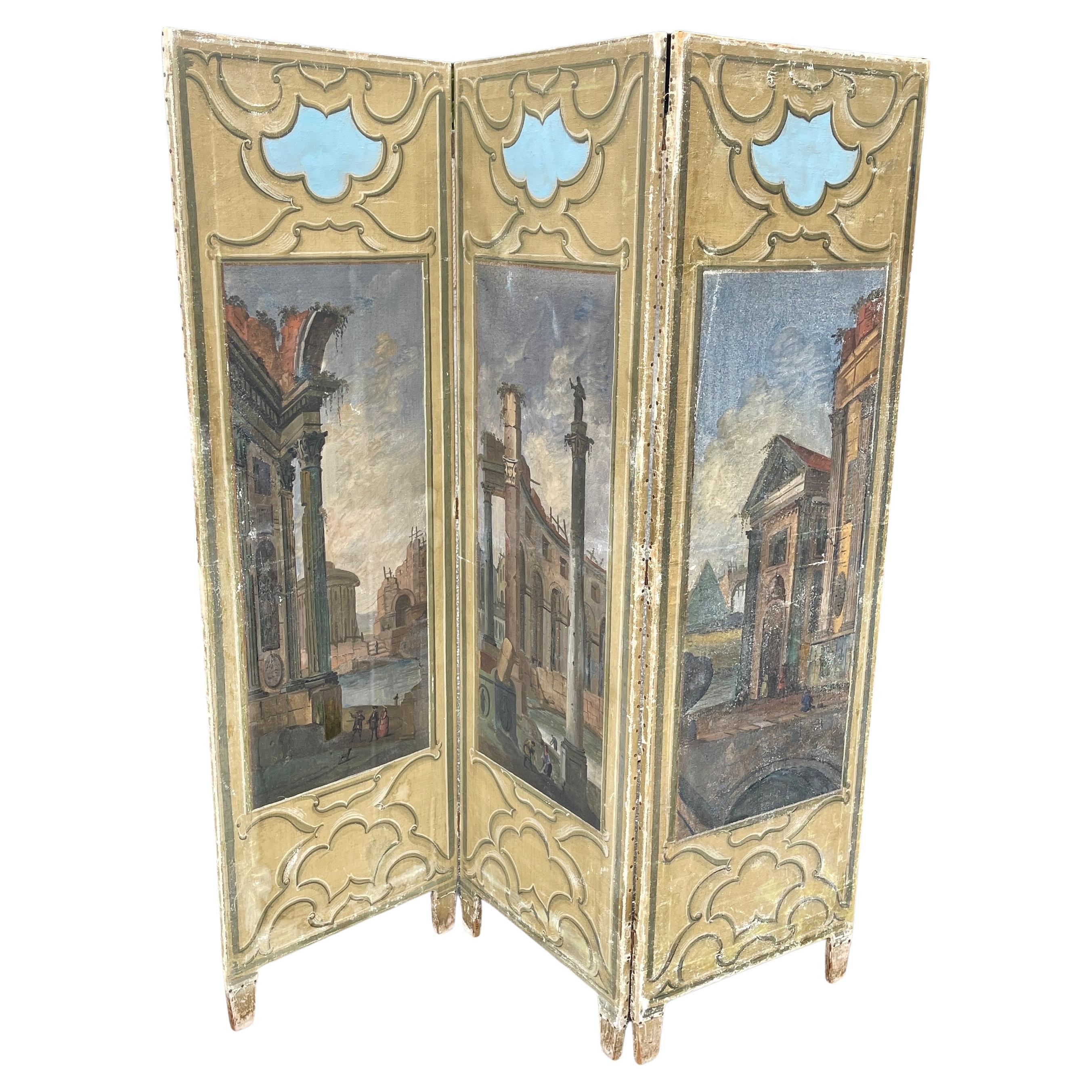 Three panel hand painted room dressing screen divider, Italy.

A 1800s Italian Neoclassical 3 panel floor screen, room divider. Hand painted on canvas panels depicting early Roman, Pompeii ruins. Wonderful colors of French blues and Tuscan colors.