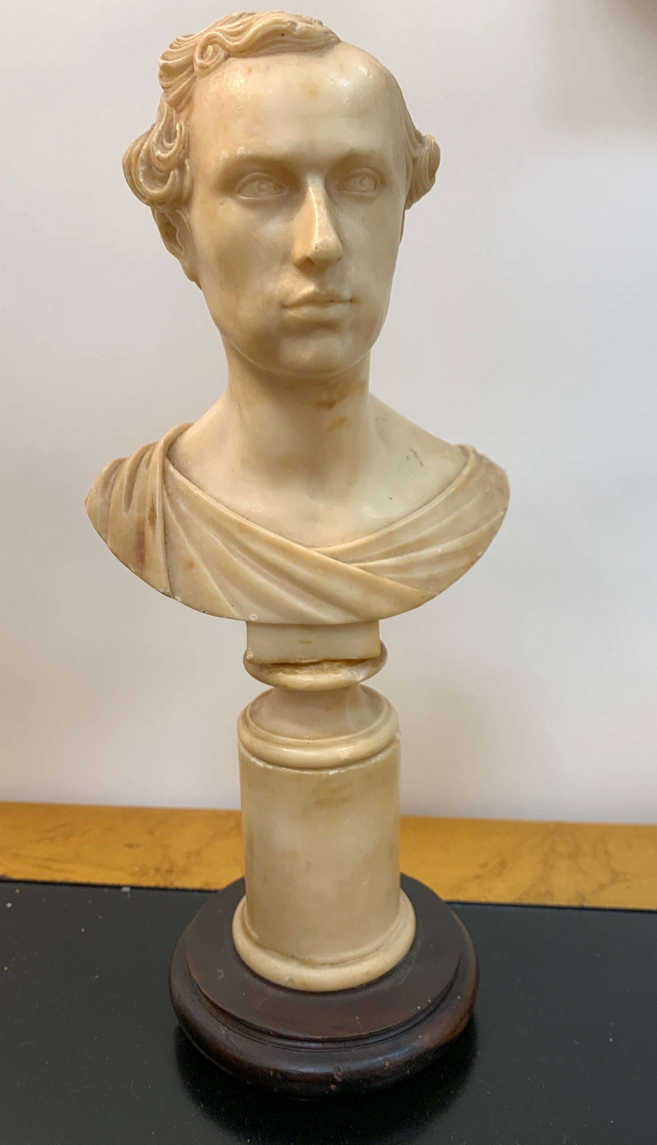Italian neoclassical Alabaster portrait bust of a gentleman, by Insom Fece, 1839
Finely detailed portrait bust of young man with wavy hair. Inscribed signature on back right shoulder 