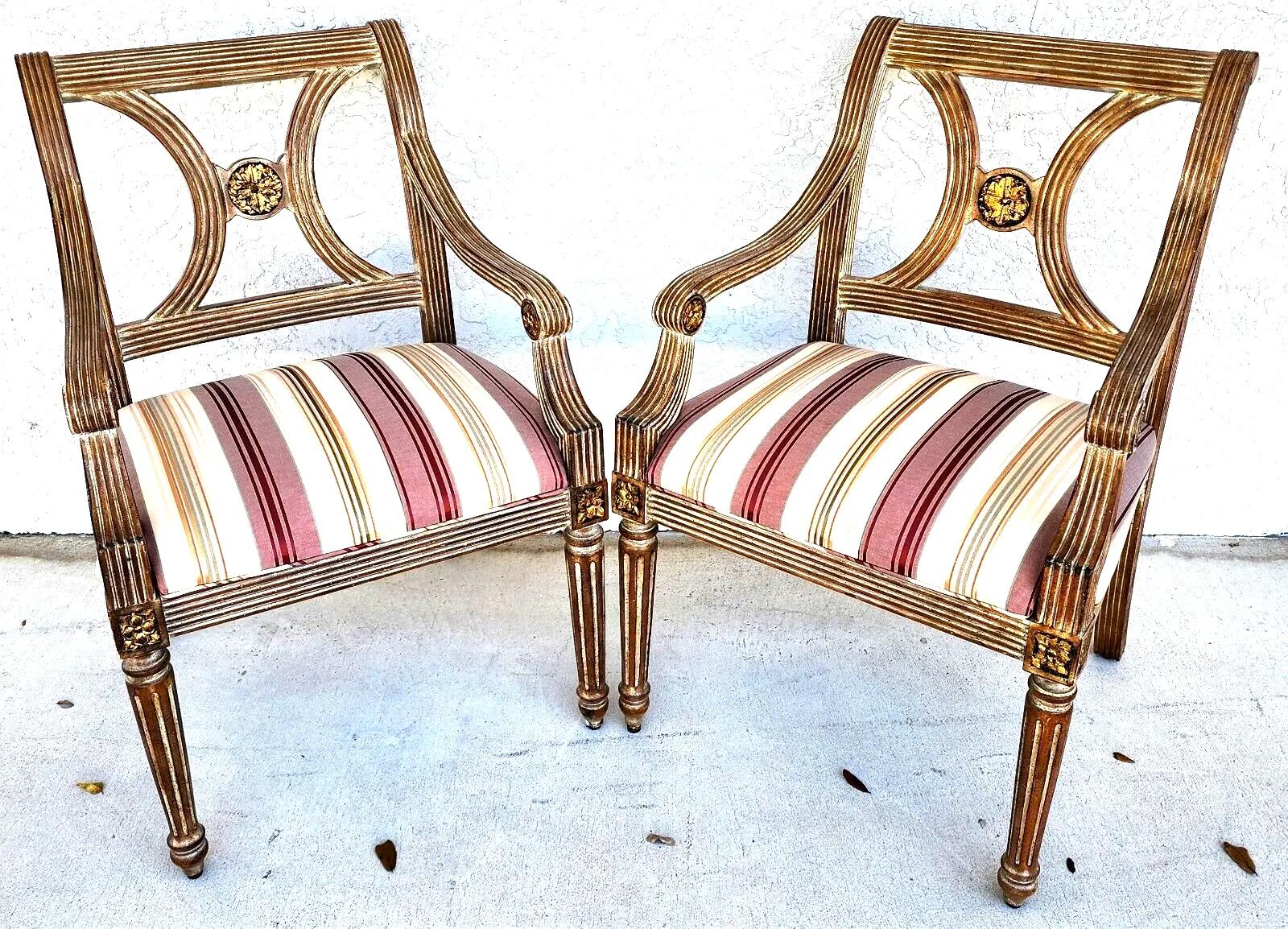 For FULL item description click on CONTINUE READING at the bottom of this page.

Offering One Of Our Recent Palm Beach Estate Fine Furniture Acquisitions Of A
Pair of Italian Neoclassical Armchairs by Thomasville
With gilt medallion