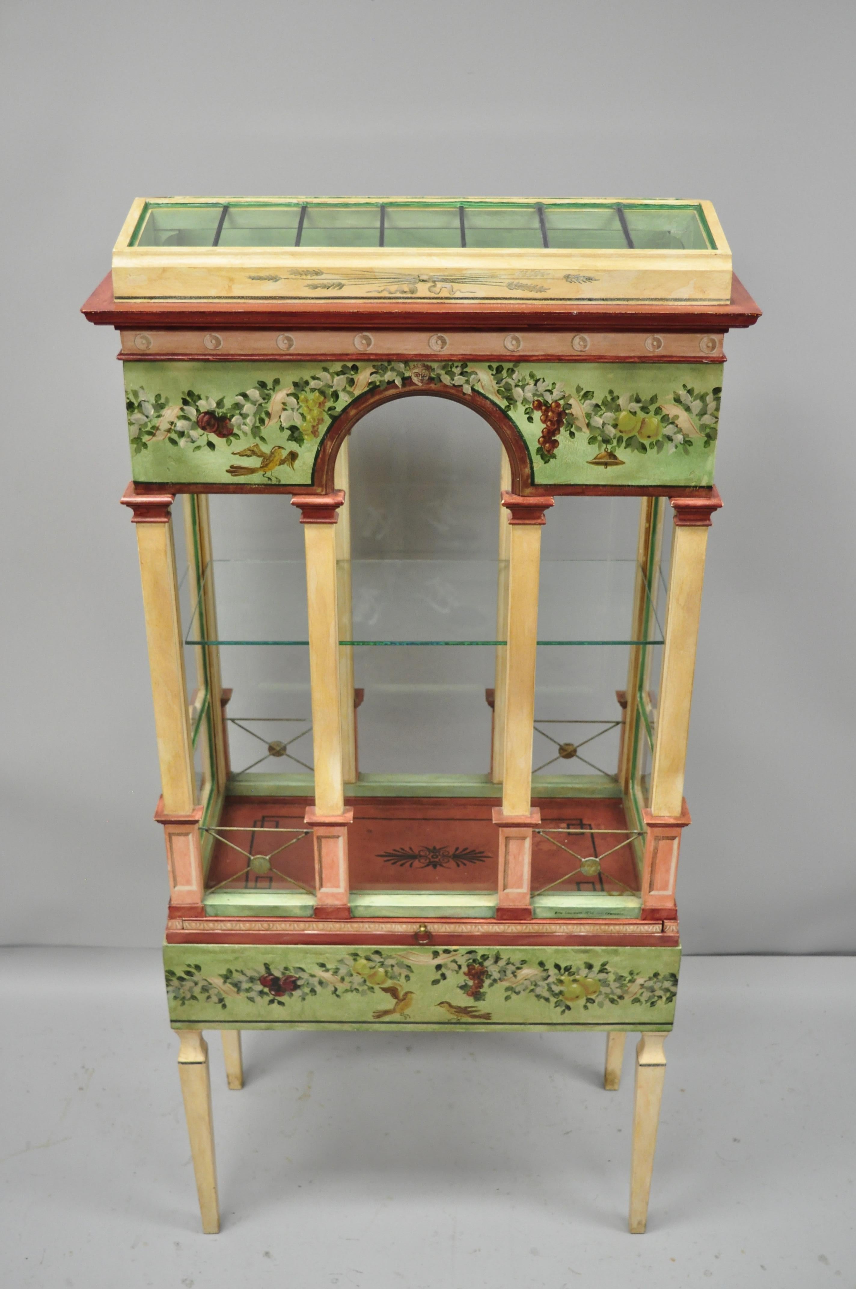 Italian neoclassical birdcage style display curio cabinet by Eric Lansdown. Item features hand-painted details inspired by Roman Frescoes, decorated on all sides, and signed by artist 