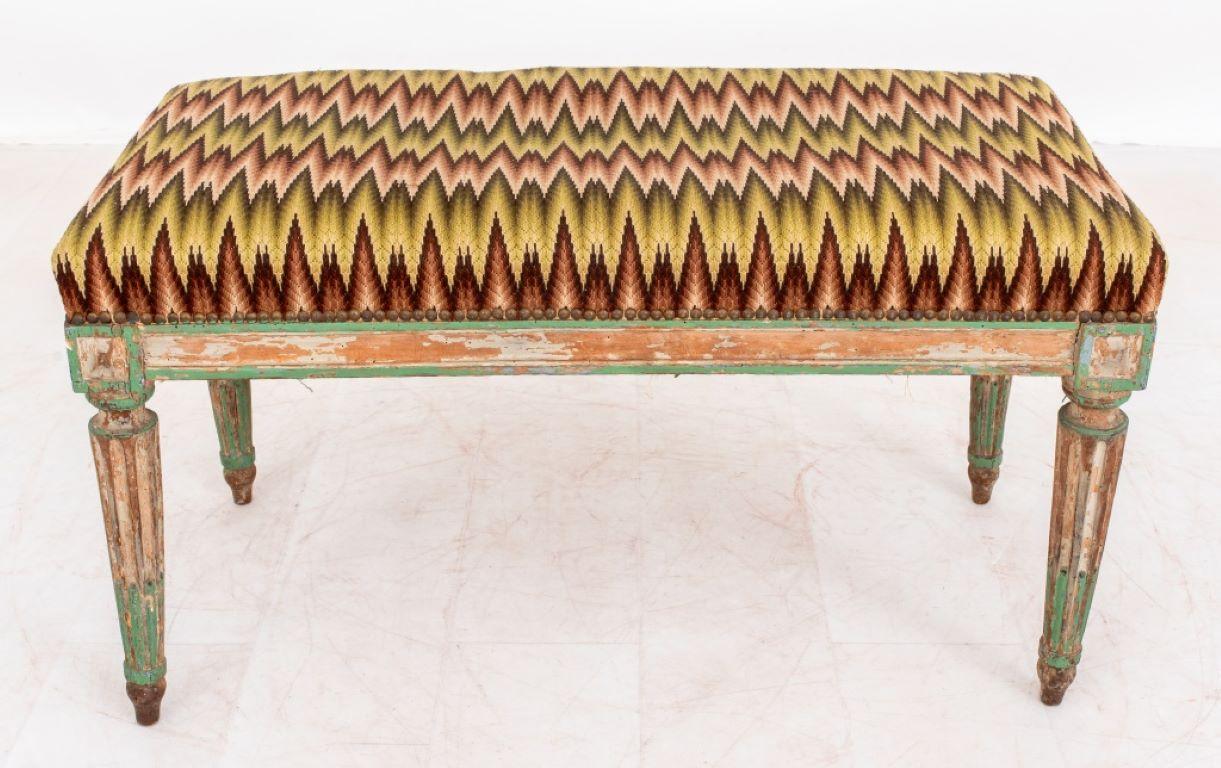 Italian neoclassical blue and gray decorated bench, the rectangular upholstered seat in flame-stitch bargello needlwork, above a molded seat rail on tapering square legs terminating in block feet. Provenance: From a 140 East 56th Street